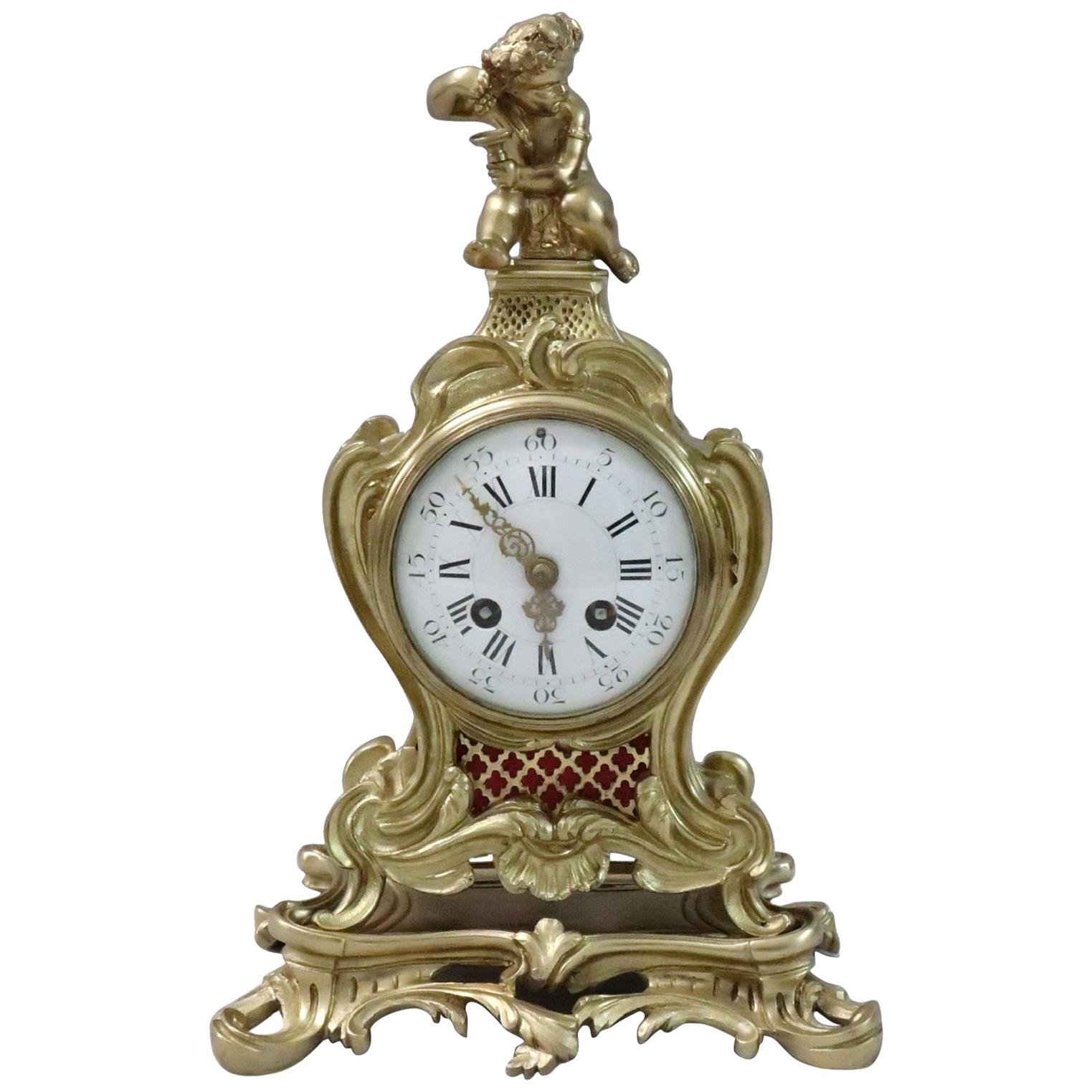 French 19th Century Brass and Gilt Rococo Style Mantel Clock by Samuel Marti For Sale