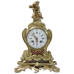 French 19th Century Brass and Gilt Rococo Style Mantel Clock by Samuel Marti