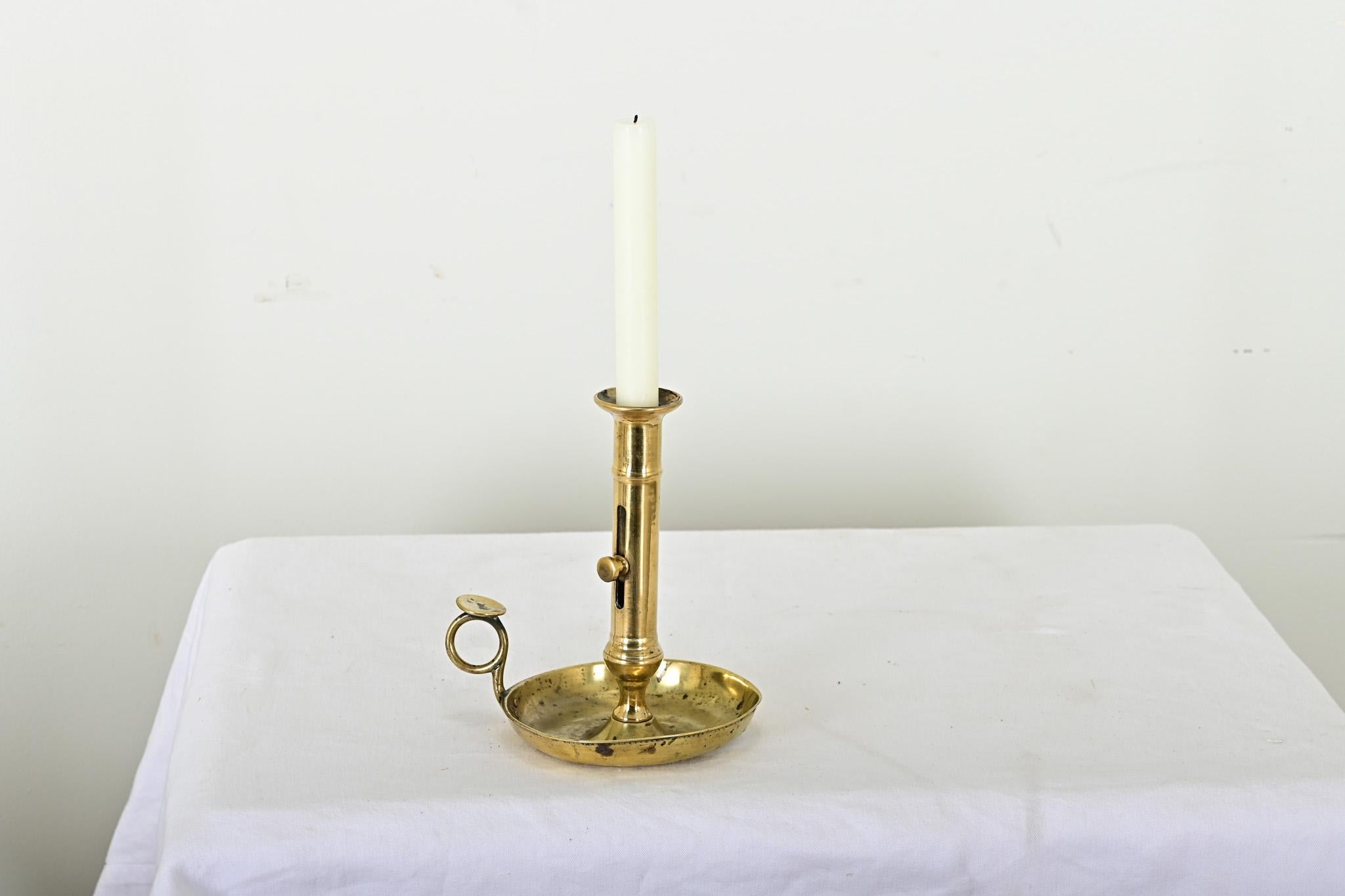 A charming French 19th century brass chamberstick with a functioning candle height adjuster. The saucer base usually indicates they were used as “chambersticks” rather than “candlesticks”, and meant for one’s bedside table. Charming patina and