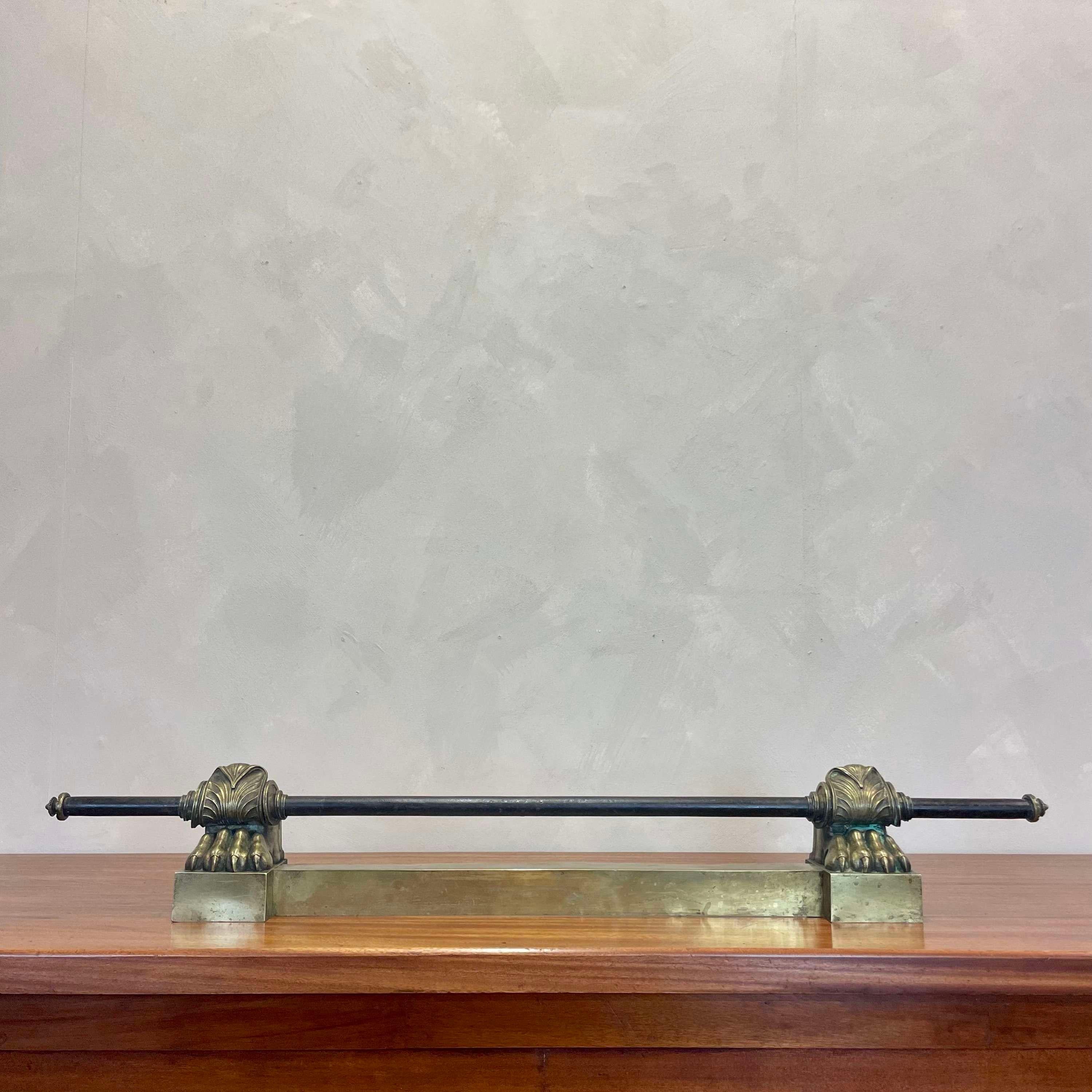 Stunning French 19th century, brass fire fender rail.
Elegant brass lion paw supports, with scrolled detail either side 
A perfect addition to any style of fireplace that's not to overpowering in the room 
Could also easily be wall mounted as a