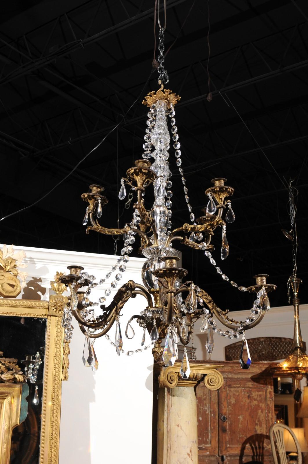 French 19th Century Bronze 10-Light Tiered Chandelier with Large Crystal Stem In Good Condition For Sale In Atlanta, GA