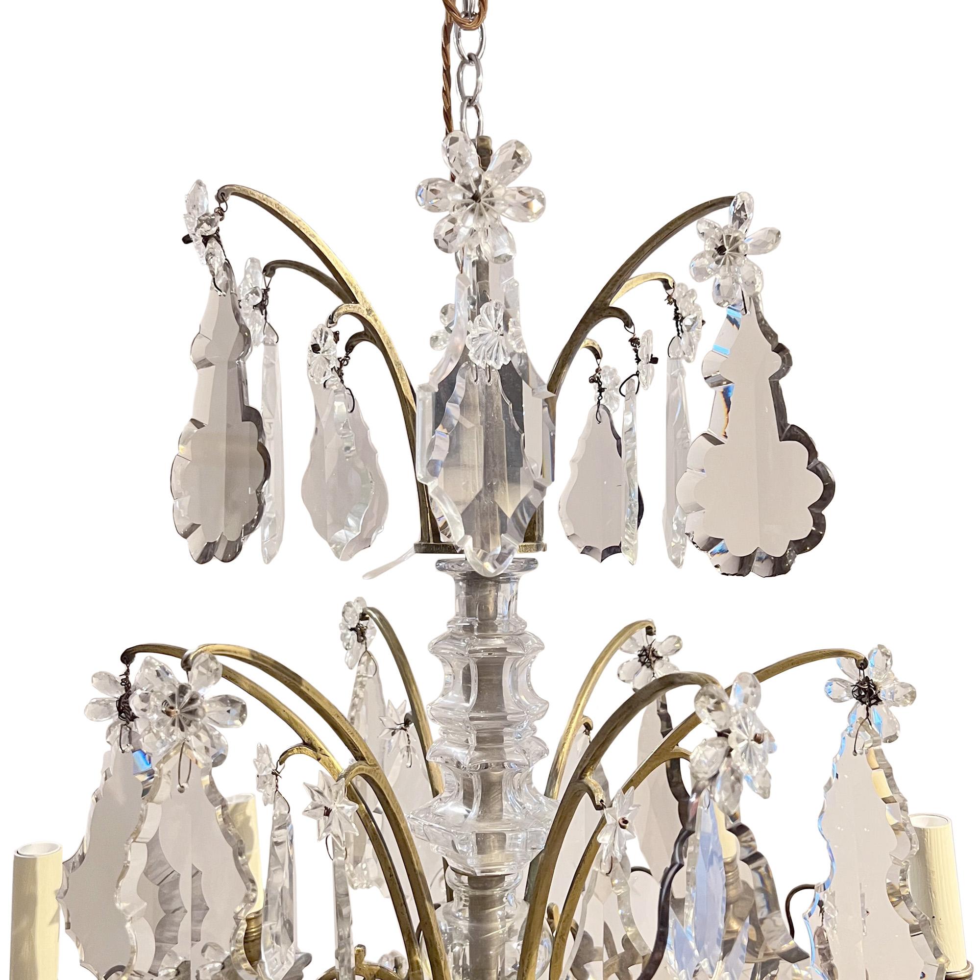 This beautiful chandelier was made in France in the 19th century.

Crafted from bronze with a mixture of clear glass and slightly tinted purple drops. All original.

Superb quality with lovely detail. Please take a look at all our pictures to see