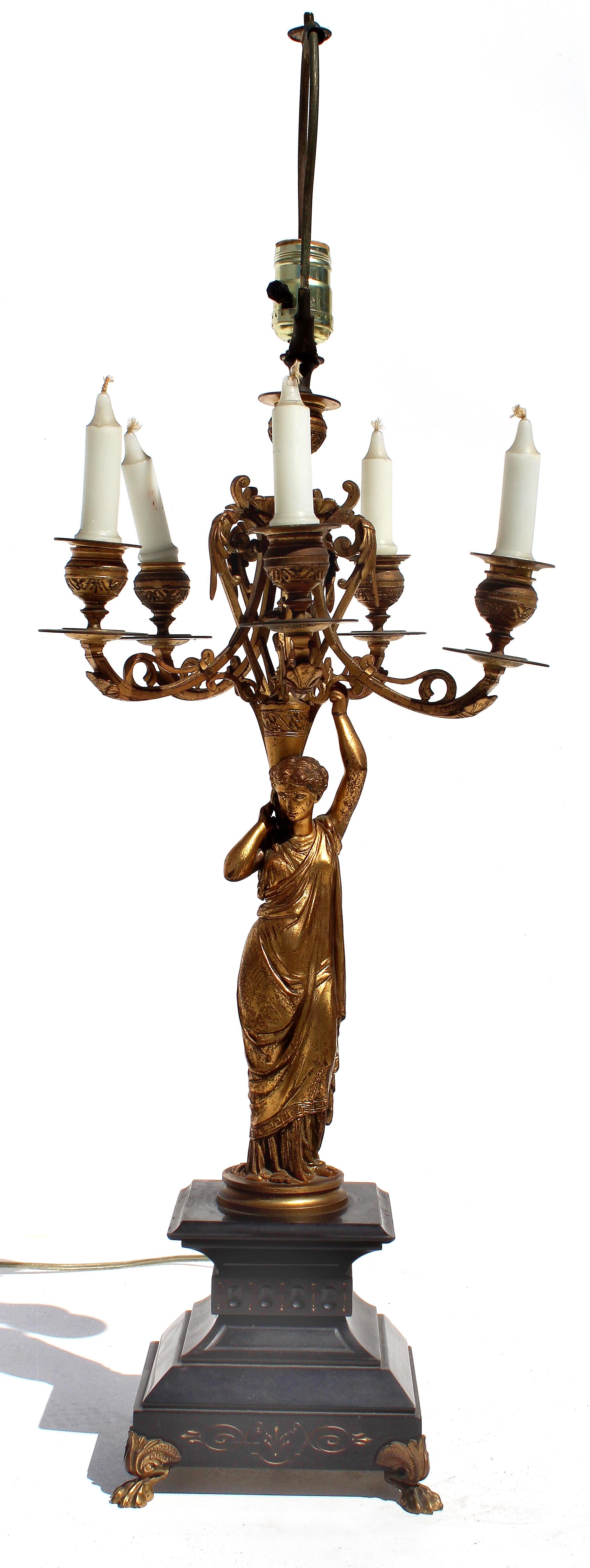 French 19th Century Bronze Doré and Marble Figural Candelabra, Mounted as a Lamp

Offered for sale is a French 19th century bronze doré and marble figural candelabra, electrified and mounted as a lamp. A draped female figure supports the candelabra