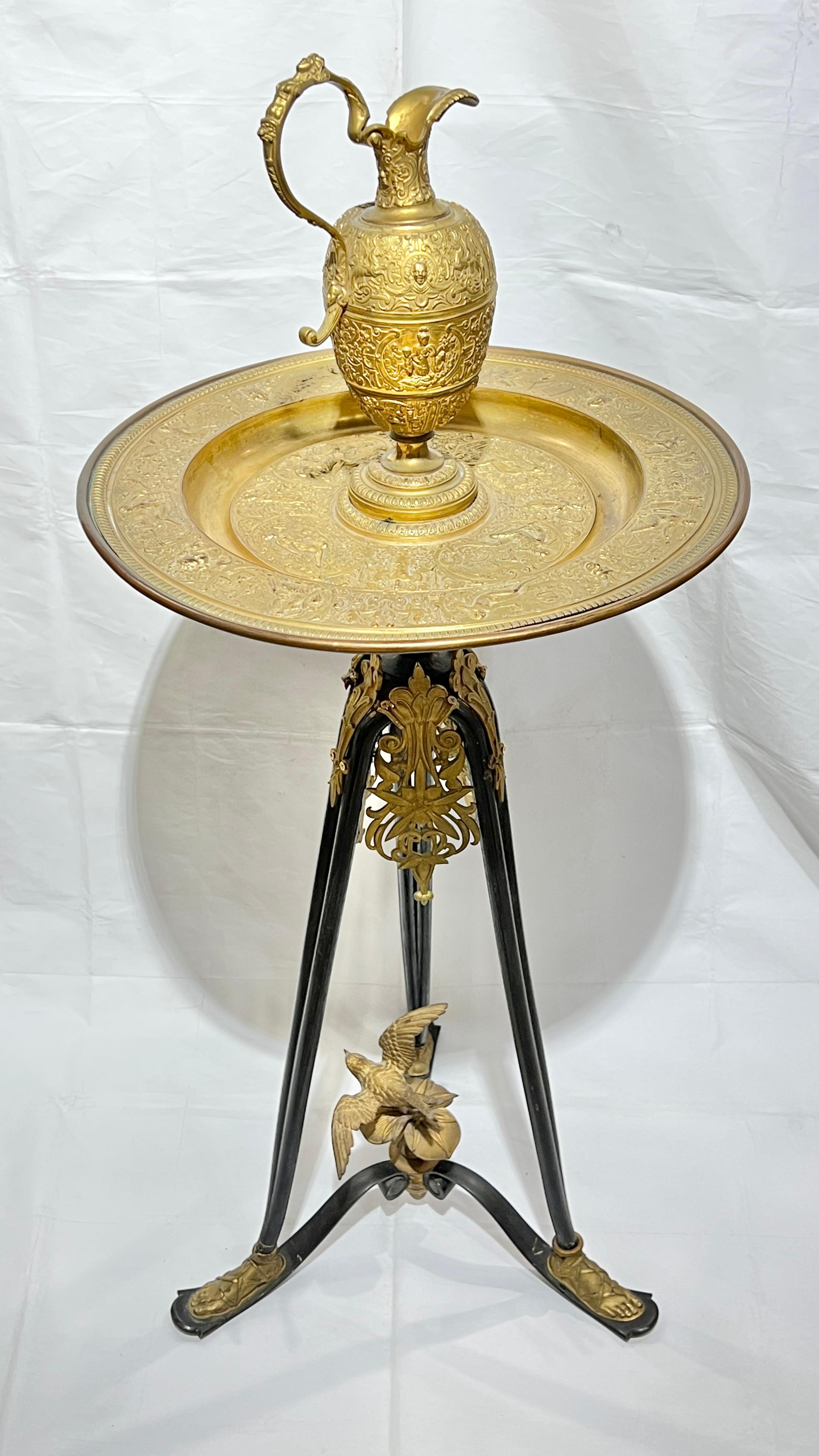 Antique (19th century) French gilt bronze and electroplate  ewer and basin on tripod stand in the Roman neoclassical style, exceptionally cast after the original model by the 16th century French Mannerist sculptor,  Francois Briot (1550-c1615).  42