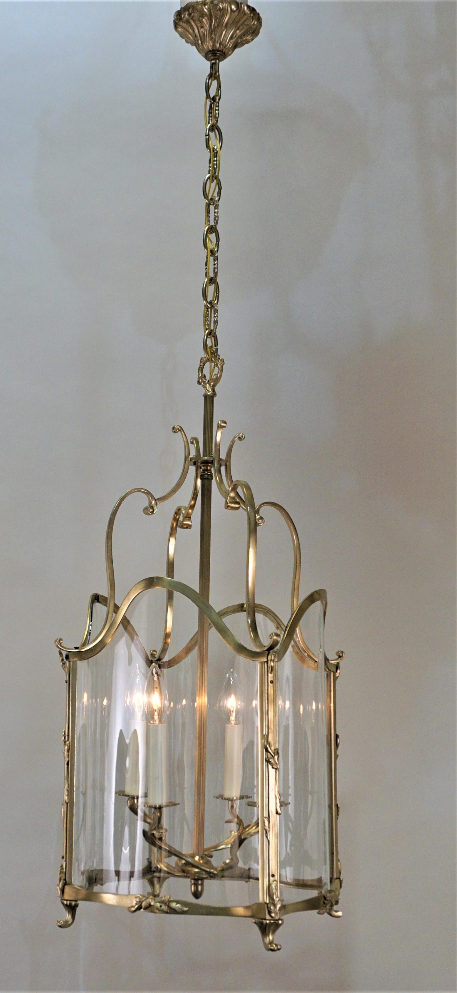 Elegant French electrified bronze lantern with carved panels.
Four-light 60 watts each
Measures: Total height of the frame is 30
