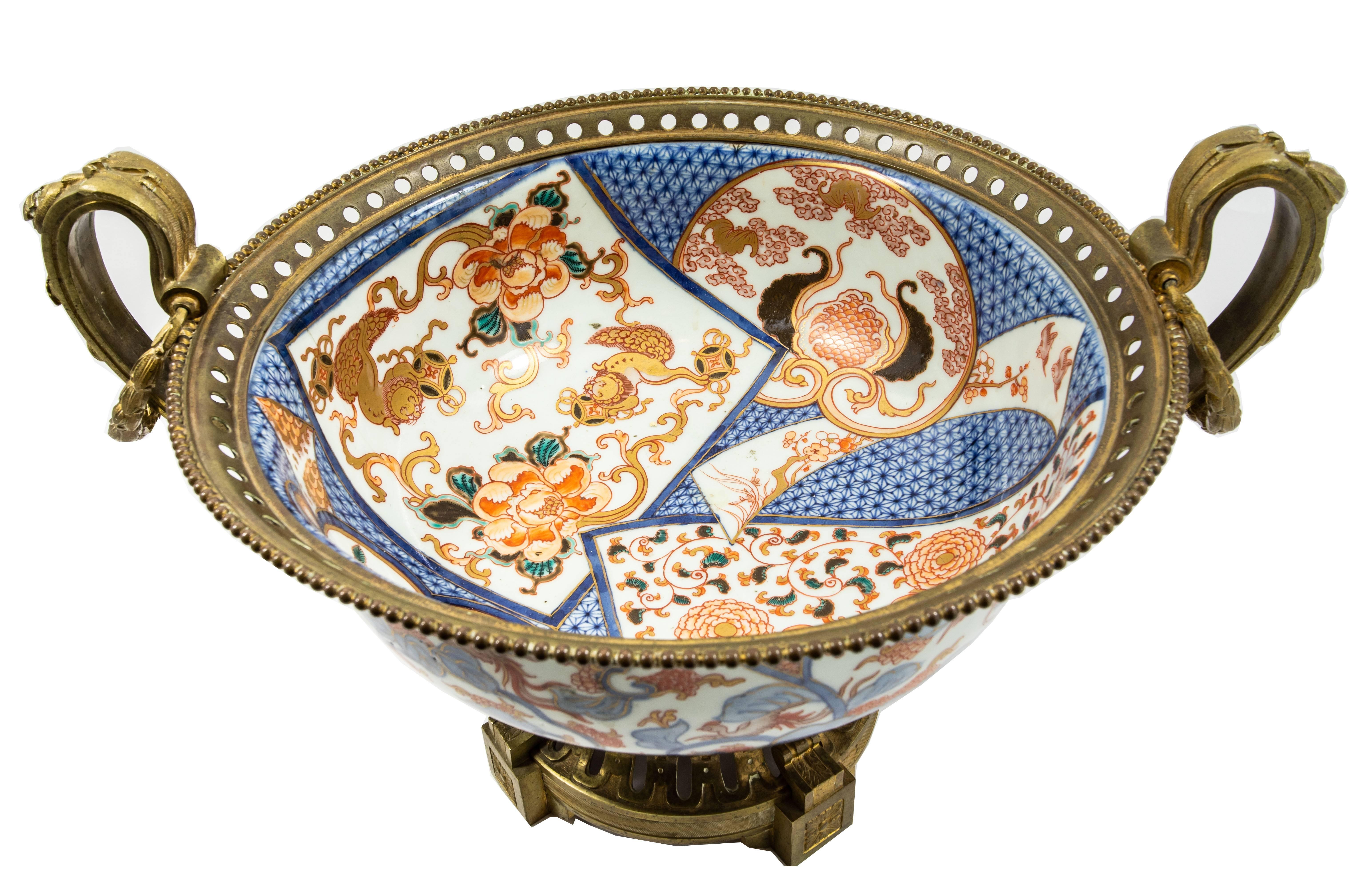 A very fine quality French 19th century bronze-mounted Imari porcelain centerpiece.
The Imari bowl is Chinese.
The bronze mounts are in Louis XVI style.