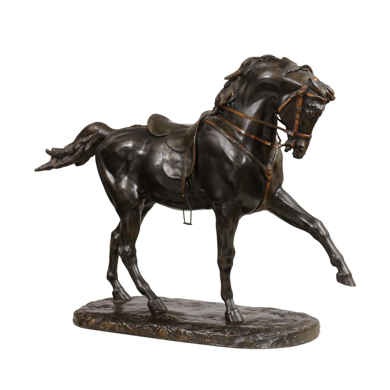 A French bronze sculpture from the 19th century, depicting a horse with left leg raised, on oval base. Created in France during the 19th century, this bronze statuette features an elegant horse depicted in an energetic position, his front left leg