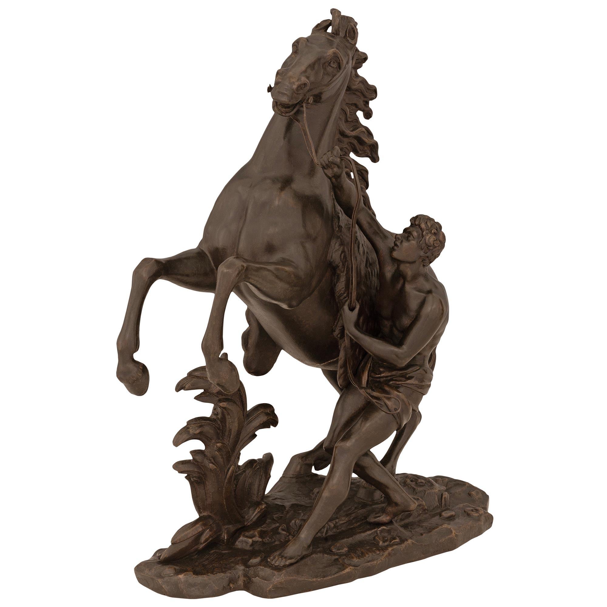 Patinated French 19th Century Bronze Statue Of A Horse And Groom For Sale