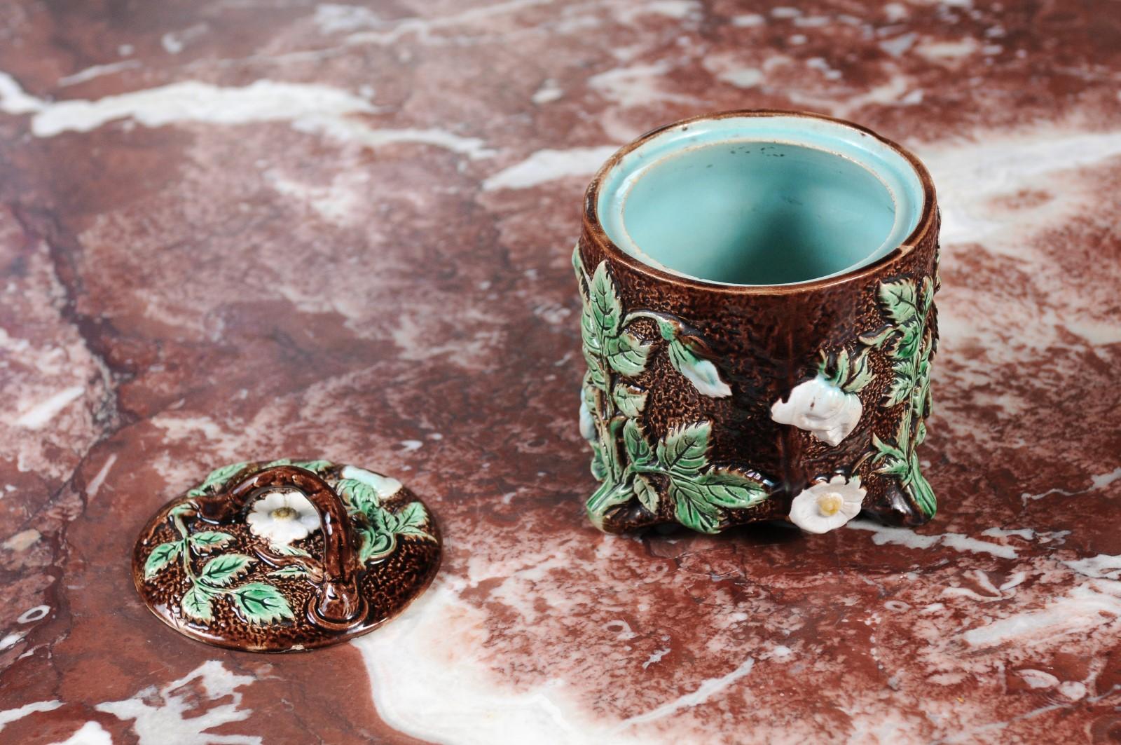 French 19th Century Brown Majolica Lidded Jar with Moulded Floral Décor For Sale 1