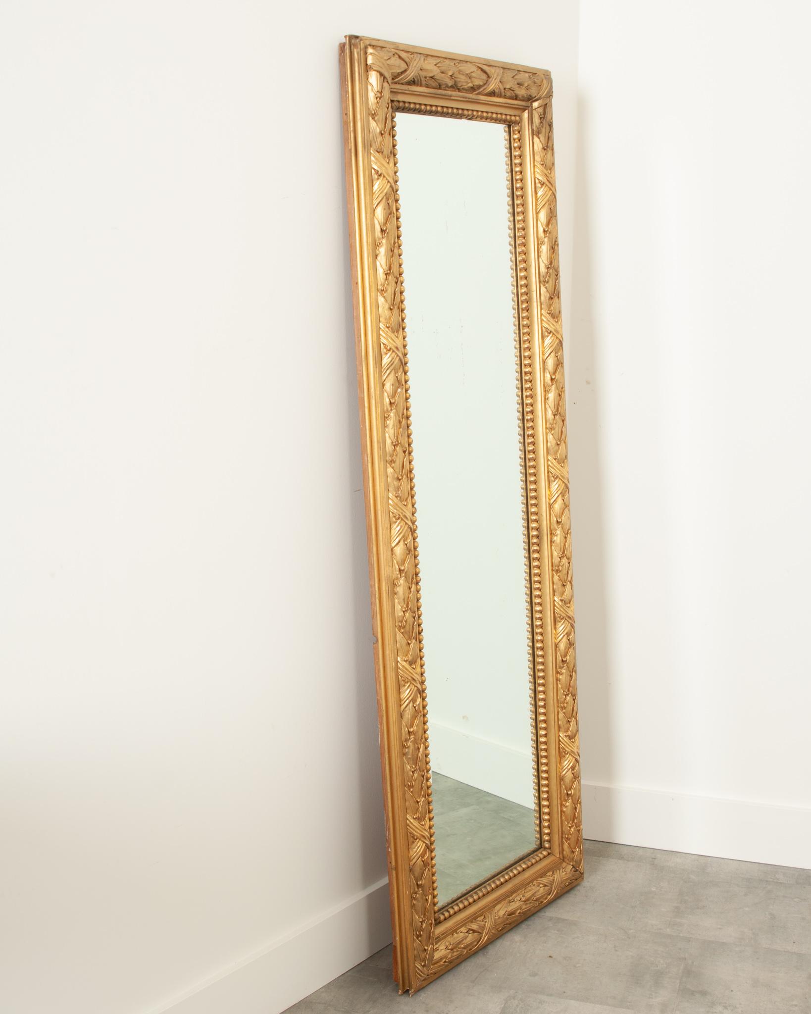 Beveled French, 19th Century, Carved Gold Gilt Mirror
