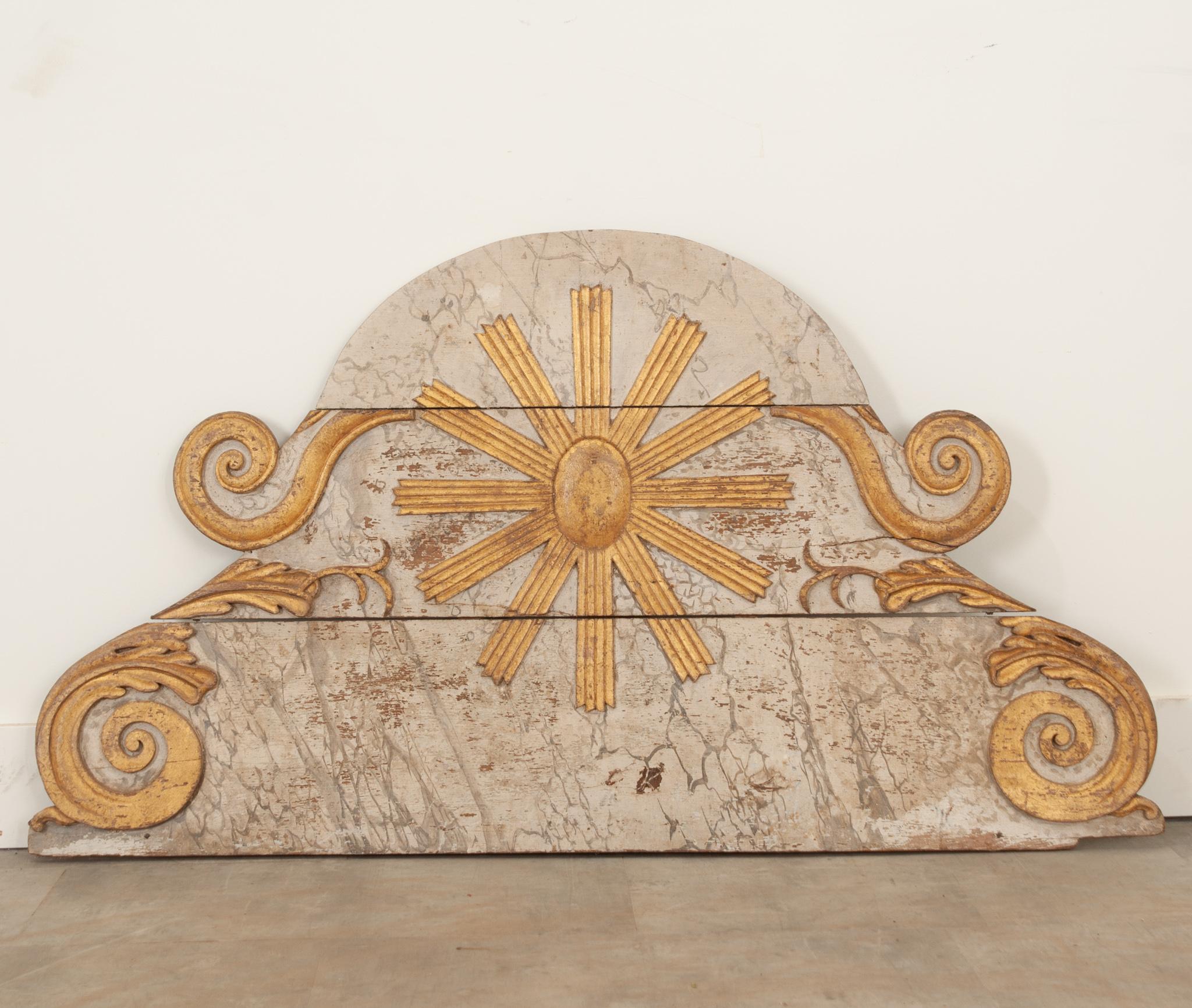 This eye-catching architectural panel will add whimsy to any interior, there are so many ways to incorporate this wonderful carving in any home. The panel is made of three boards, painted with a faux-marbled finish with a carved gold gilt starburst