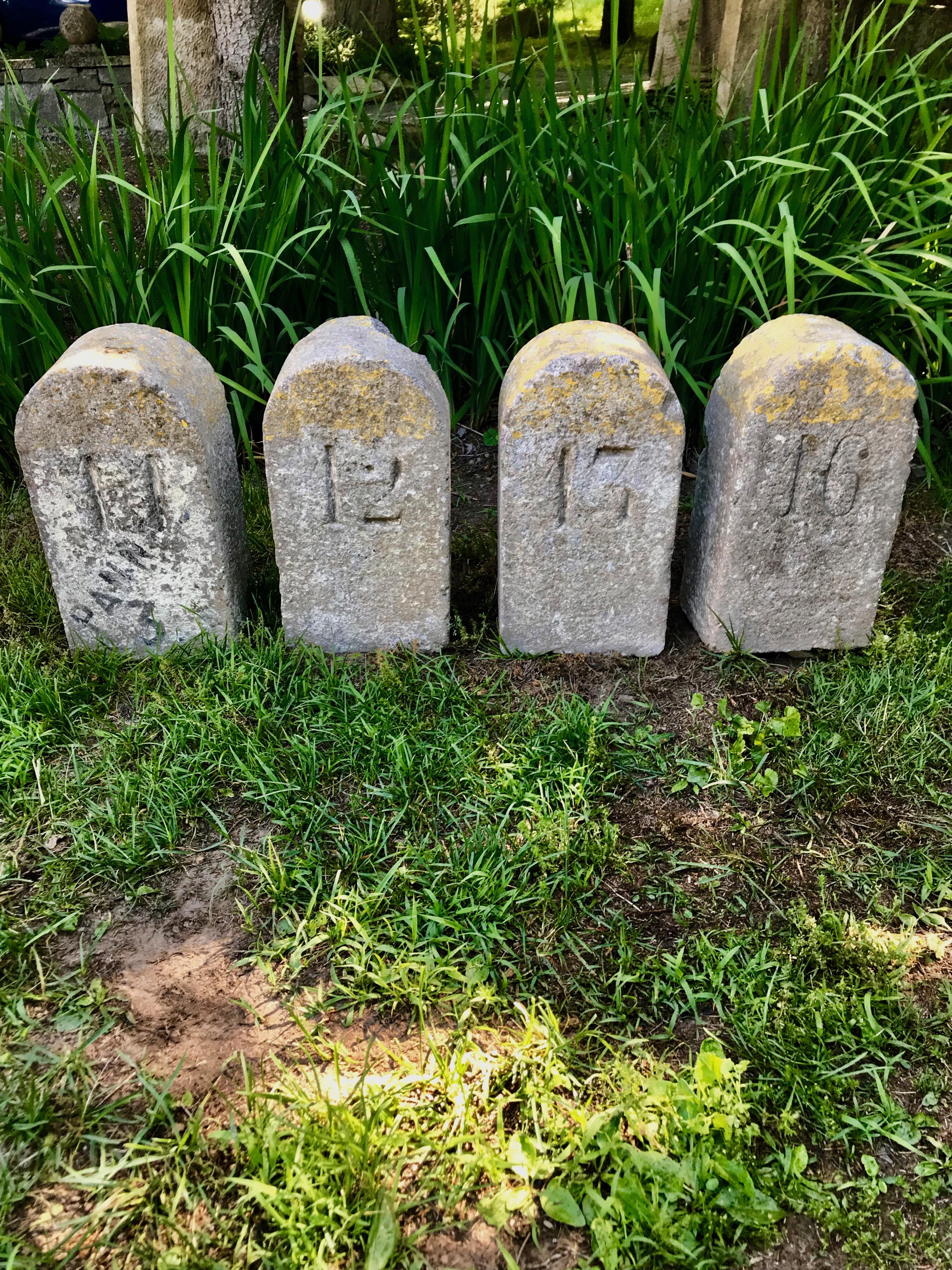 We love historical architectural pieces and these four carved stone distance markers came from outside the city of Nancy in France. Each features remnants of old yellow and white paint and they have large carved numbers in them: Numbers 11, 12, 13