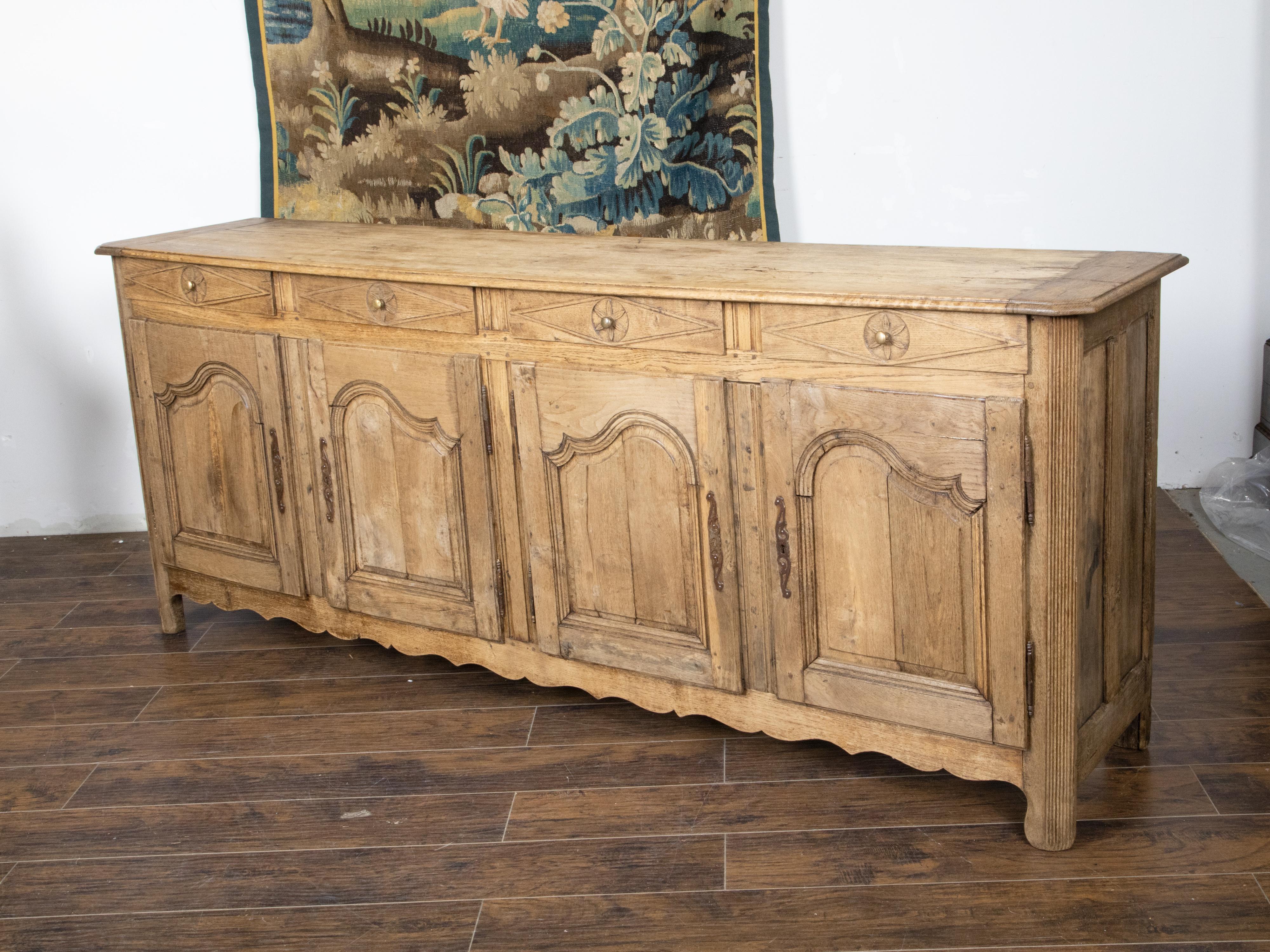 French 19th Century Carved Walnut Enfilade with Four Drawers over Four Doors 5