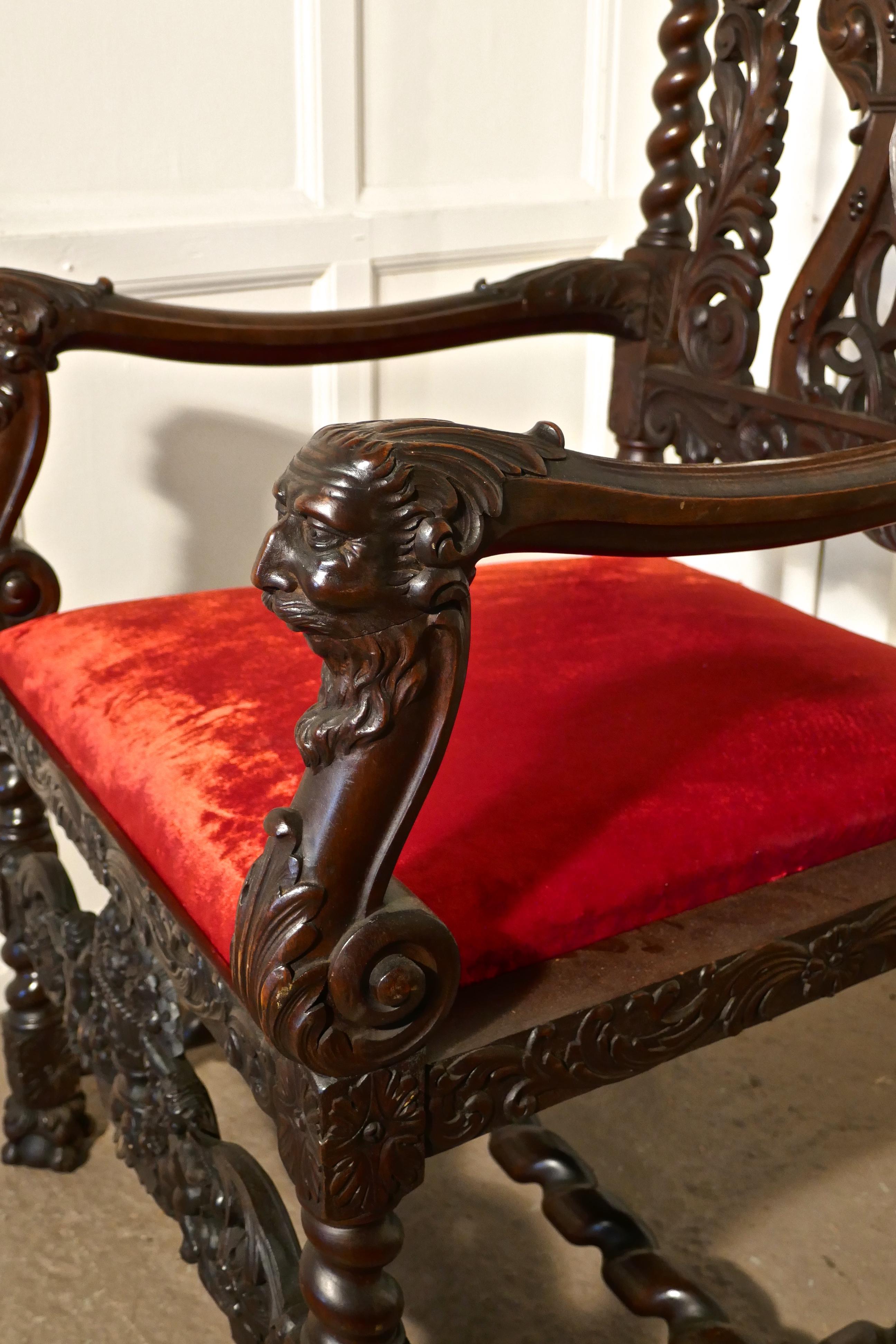 French 19th century carved walnut throne or hall chair.

This very tall chair is a superb and intricately carved piece, unusually the chair is carved on both back and front so intended to be viewed from all sides, the carved detail is