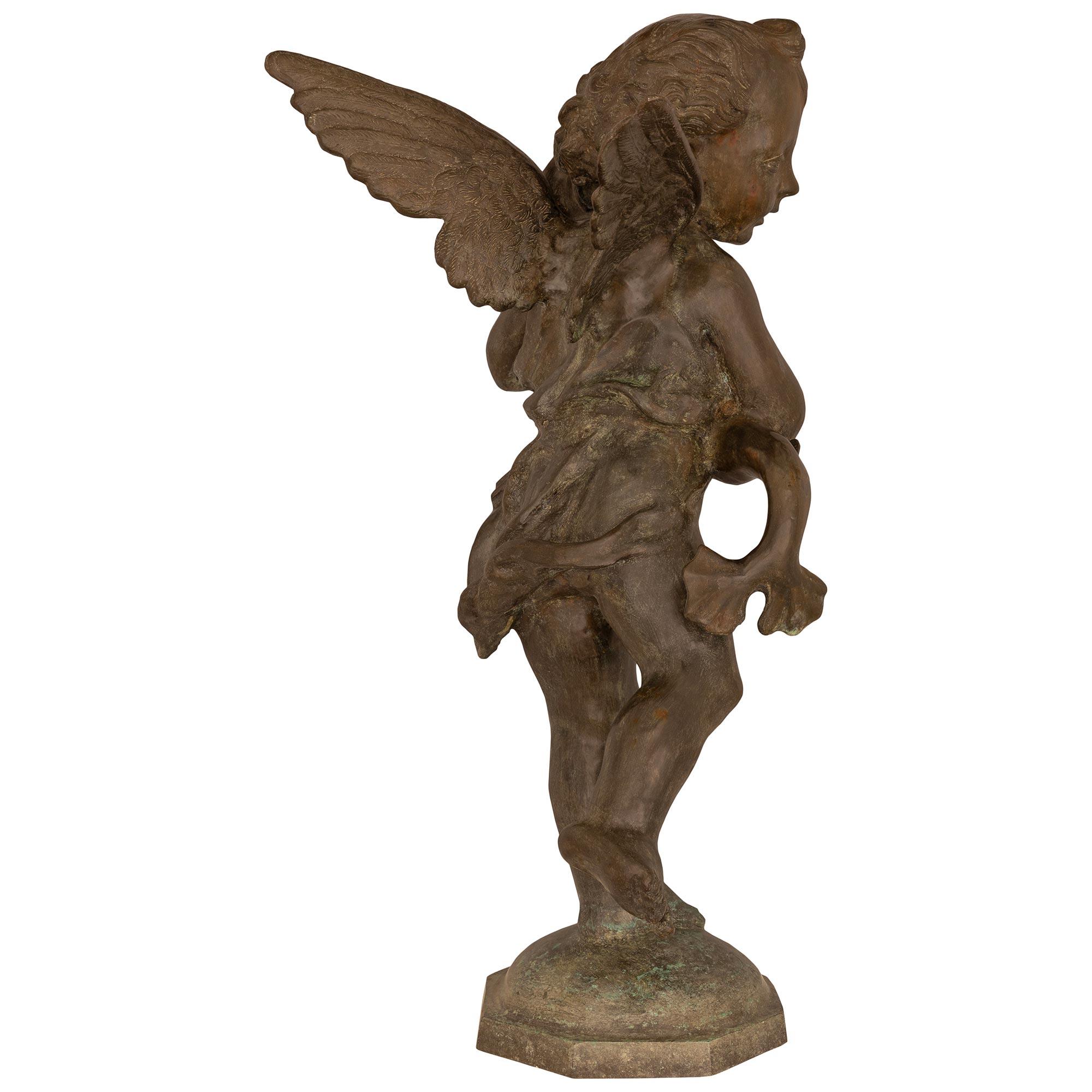French 19th Century Cast Iron Fountain Of A Young Boy Holding A Dolphin For Sale 1