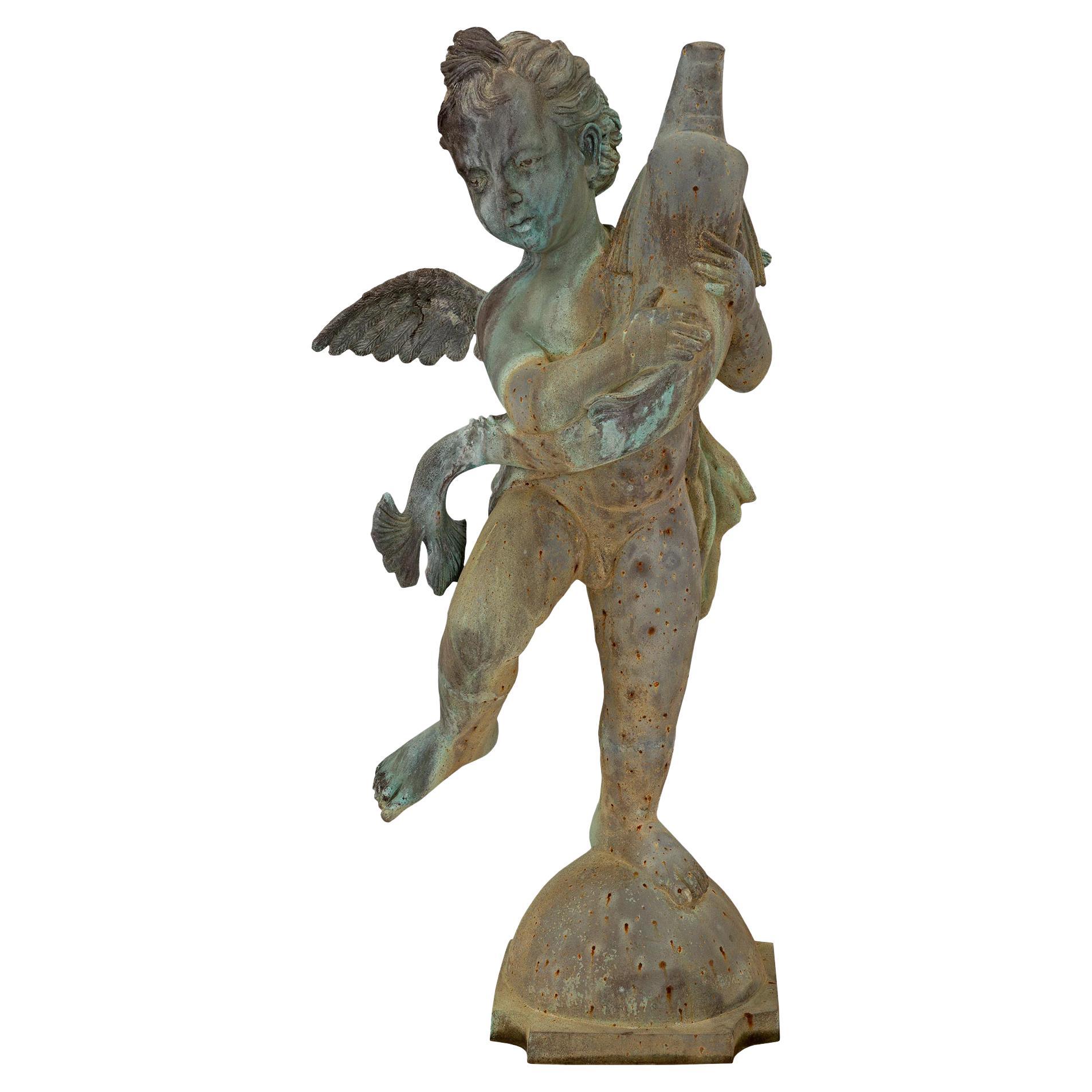 French 19th Century Cast Iron Fountain of a Young Boy Holding a Dolphin For Sale