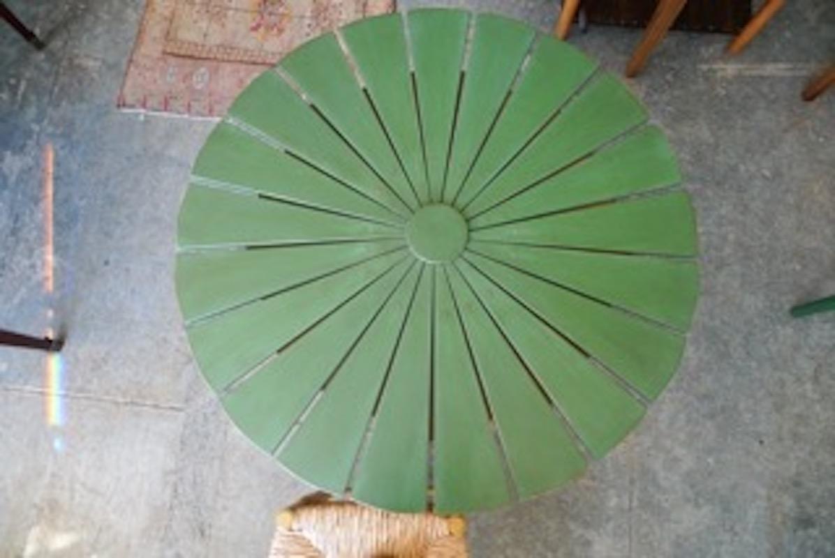 French 19th century cast iron table base with painted new slatted wood top.