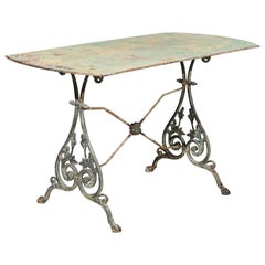 French 19th Century Cast Iron Table with Distressed Patina, Volutes and Foliage
