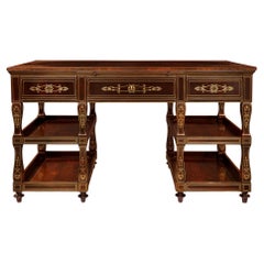 Bureau français du 19ème siècle d'époque Charles X en bois de rose et laiton incrusté