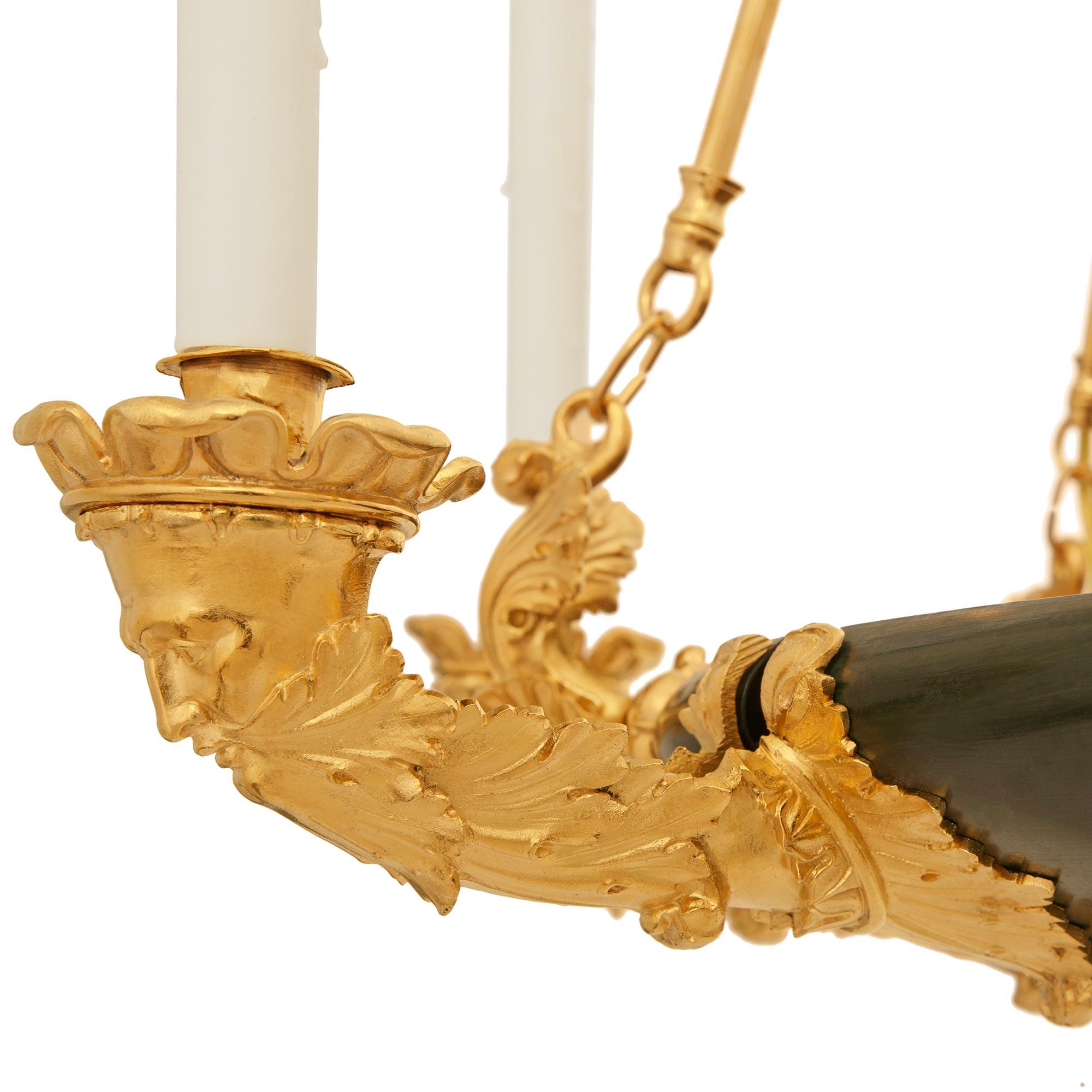 XIXe siècle Lustre en bronze patiné et bronze doré du 19ème siècle de Charles X. en vente