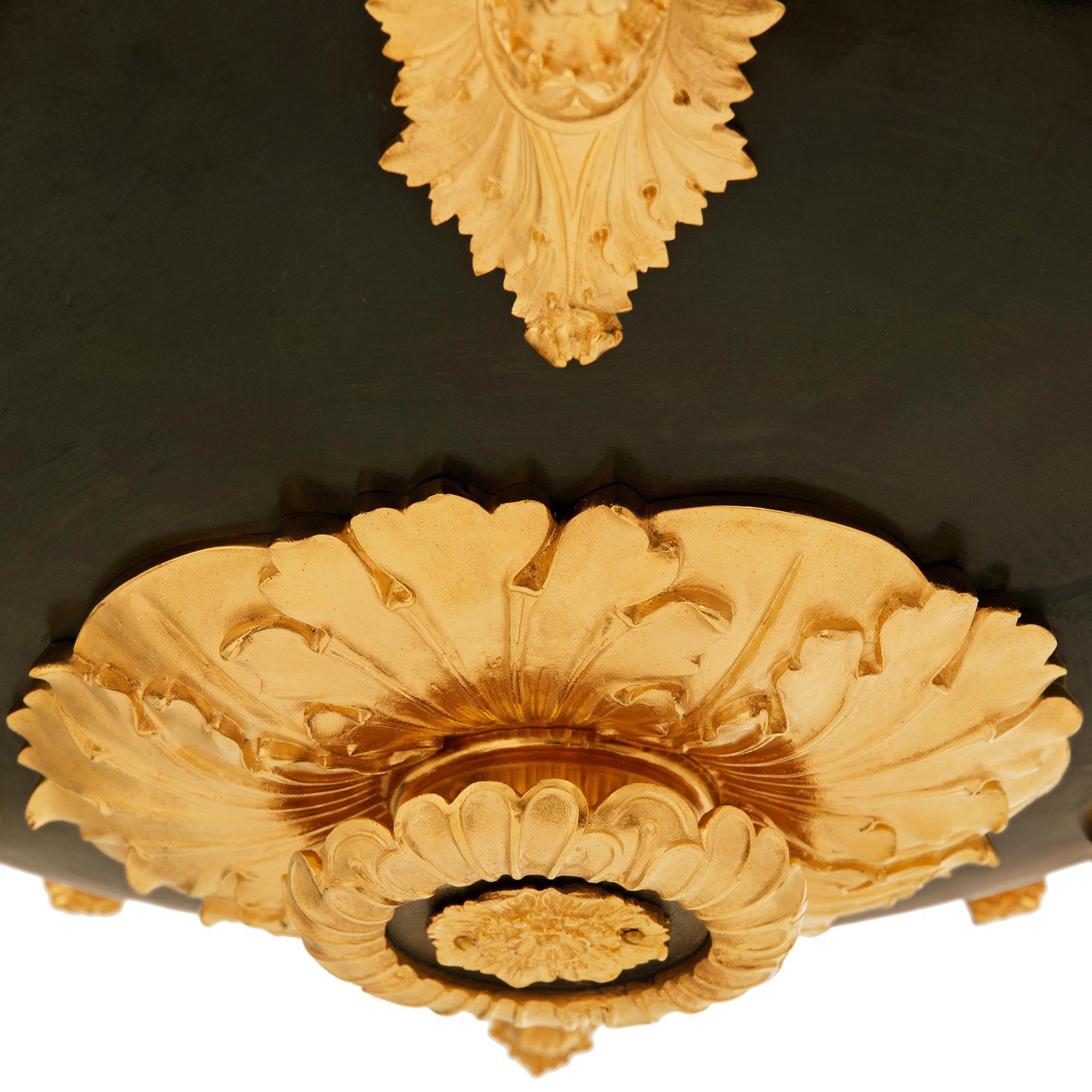 Bronze Lustre en bronze patiné et bronze doré du 19ème siècle de Charles X. en vente