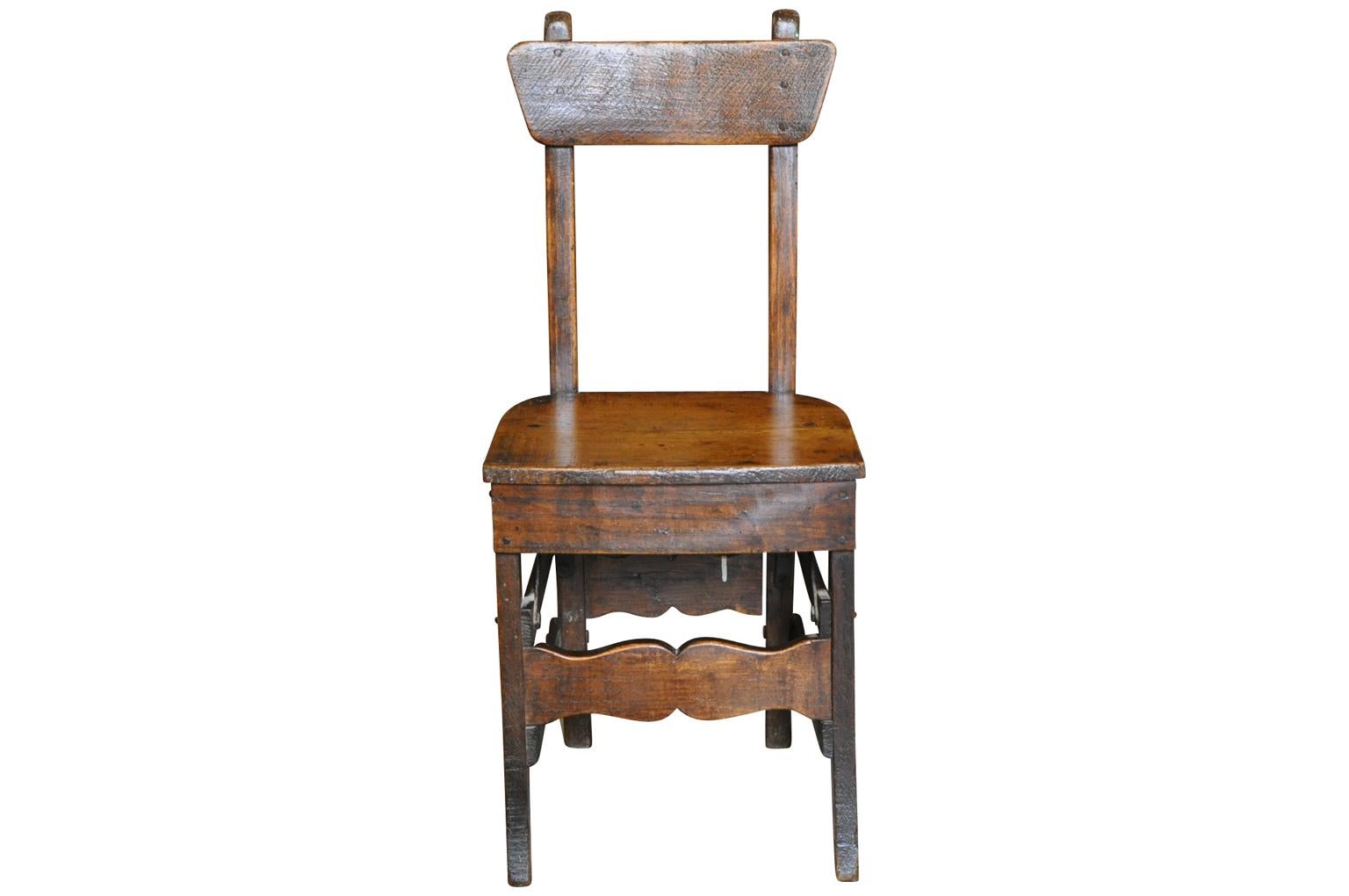 A delightful and charming child's chair from the South of France. Soundly constructed from richly stained pine and beechwood with iron supports. A wonderful accent piece for any child's bedroom or any living area.