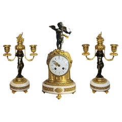 Französische Uhr und Kandelaber Cherub-Set aus dem 19. Jahrhundert