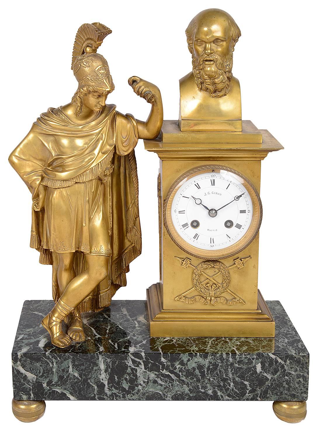 A good quality 19th century French gilded ormolu and green marble clock garniture. Having a pair of four branch candelabra with classical busts to the centre. The clock with a classical bust on top and a centurion standing to the side, raised on a
