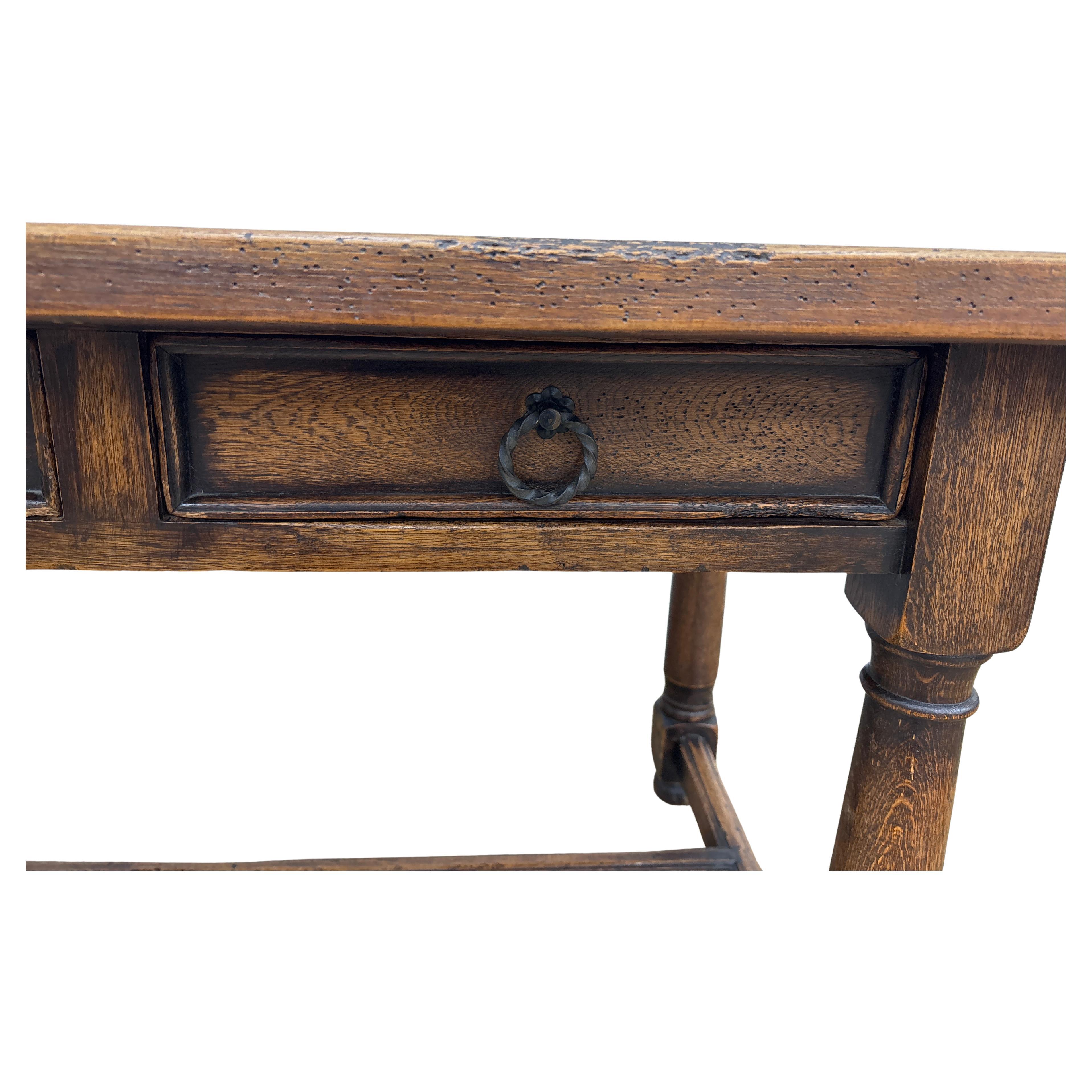 This wonderful console table is made of oak with 3 drawers at the front. Ideal to fit behind a sofa or against a wall.