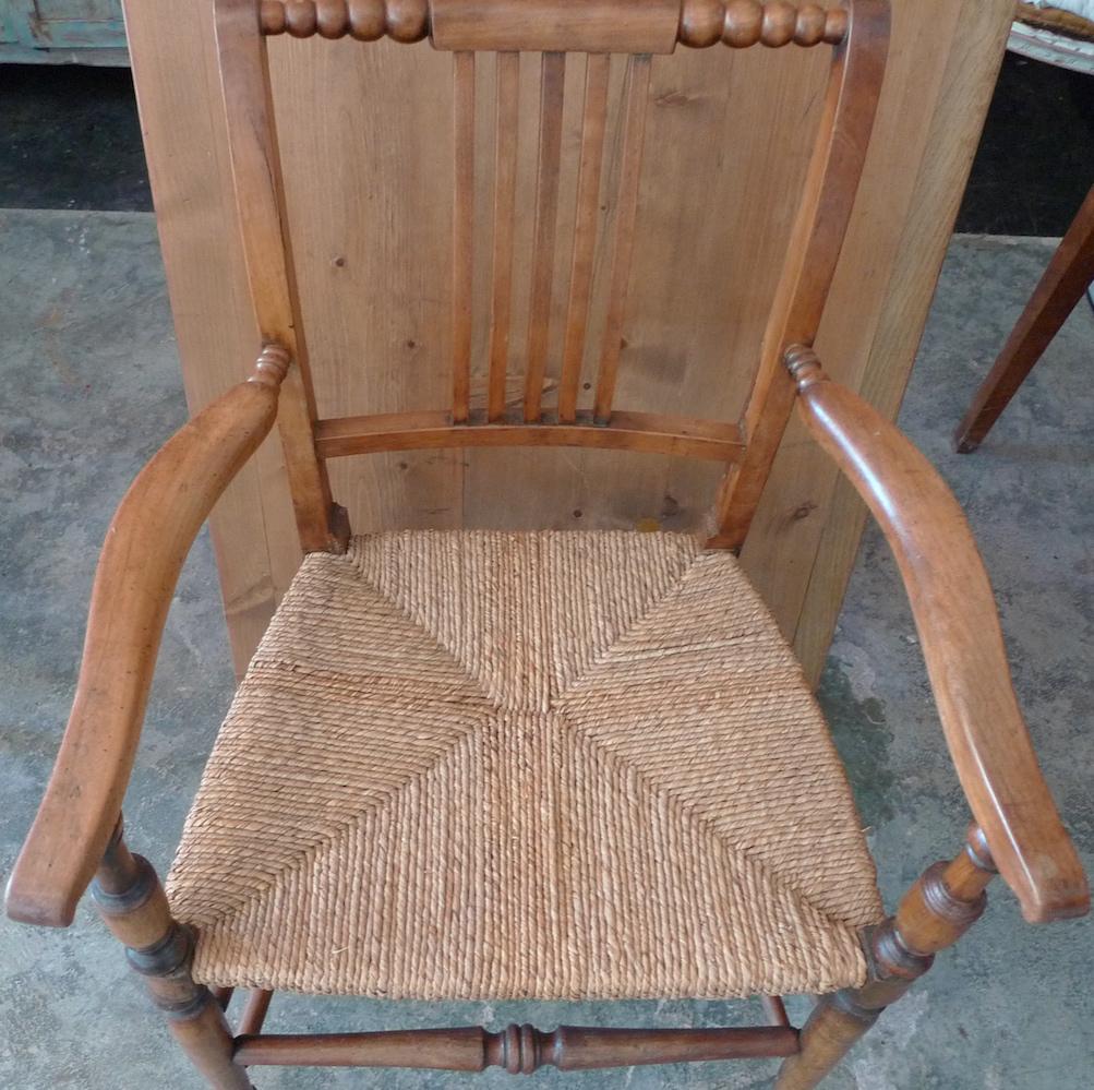 French 19th Century Country Armchair with Rush Seat. In Distressed Condition In Santa Monica, CA