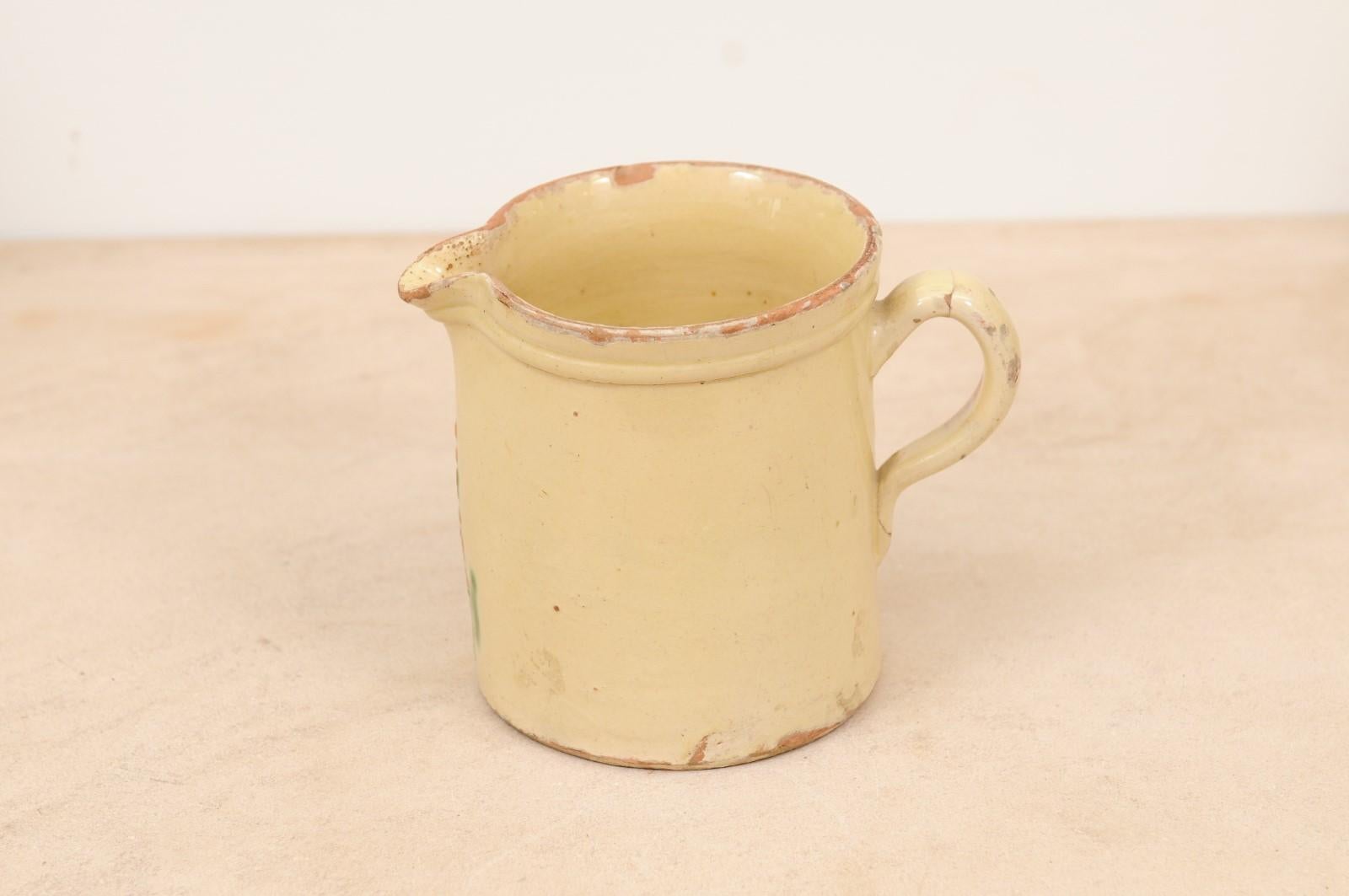 French 19th Century Cream Glazed Terracotta Pitcher with Floral Décor For Sale 3
