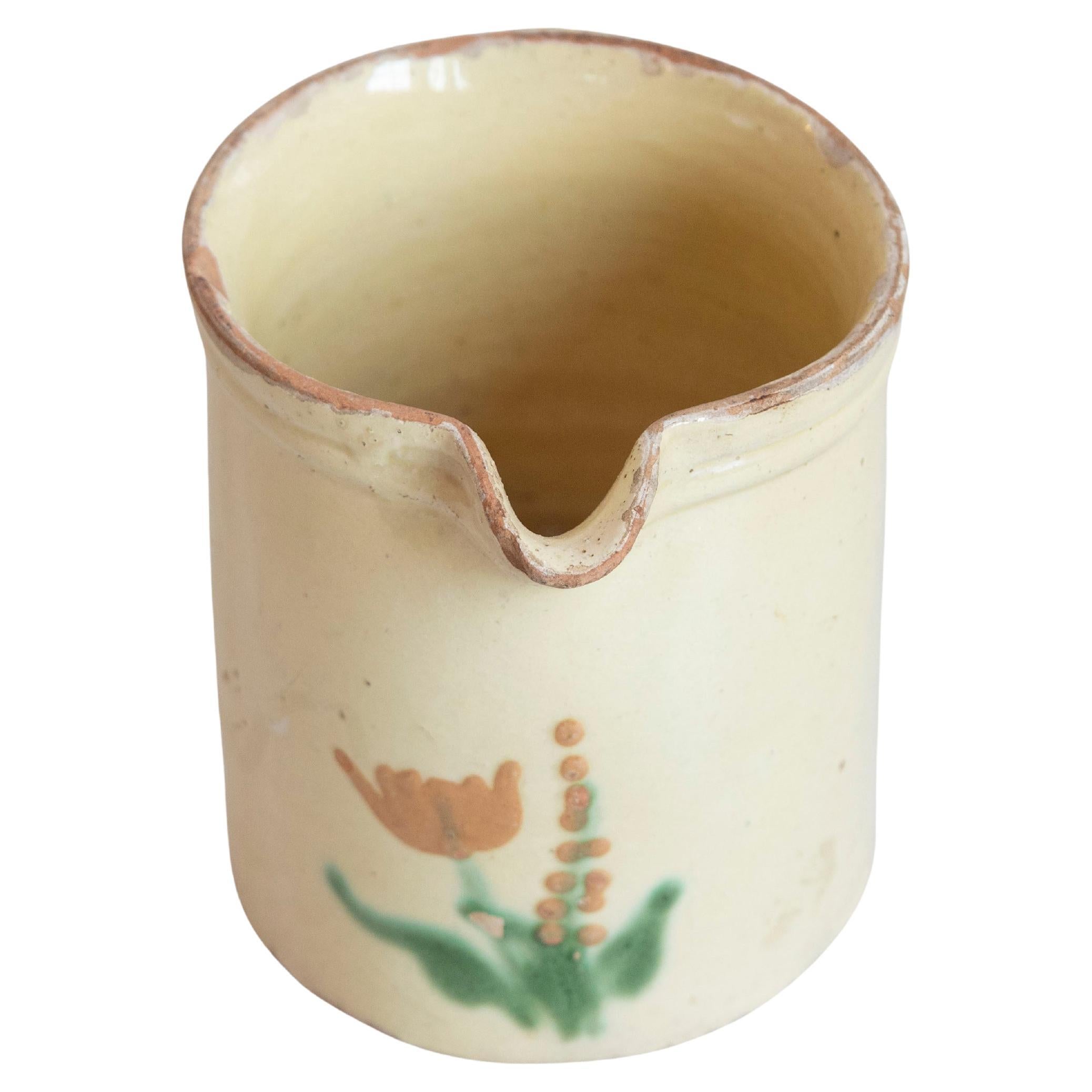 French 19th Century Cream Glazed Terracotta Pitcher with Floral Décor