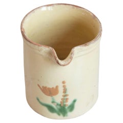 French 19th Century Cream Glazed Terracotta Pitcher with Floral Décor