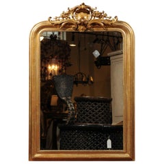 French 19th Century Crested Gilt Louis-Philippe Mirror with Shell and Flowers