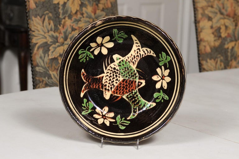 French 19th Century Dark Brown Glazed Pottery Plate with Fish and Floral Décor In Good Condition For Sale In Atlanta, GA