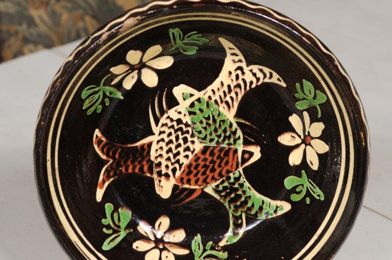 French 19th Century Dark Brown Glazed Pottery Plate with Fish and Floral Décor For Sale 1
