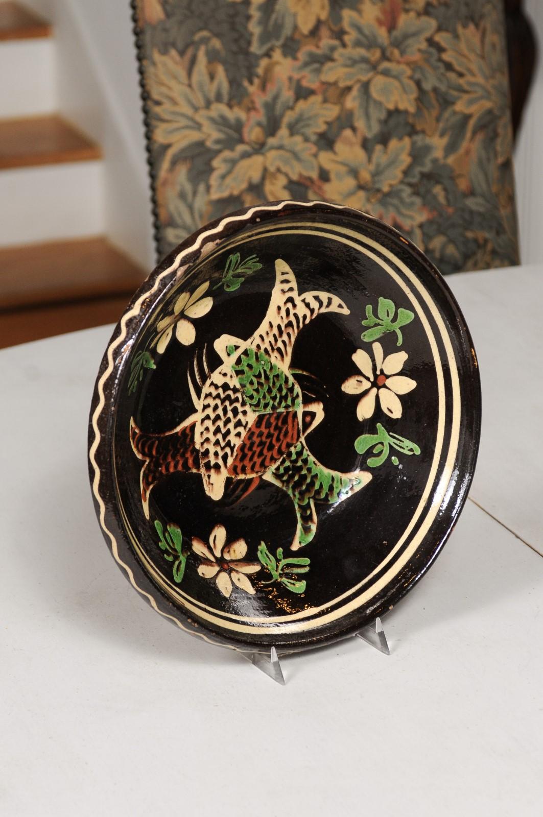 French 19th Century Dark Brown Glazed Pottery Plate with Fish and Floral Décor 1