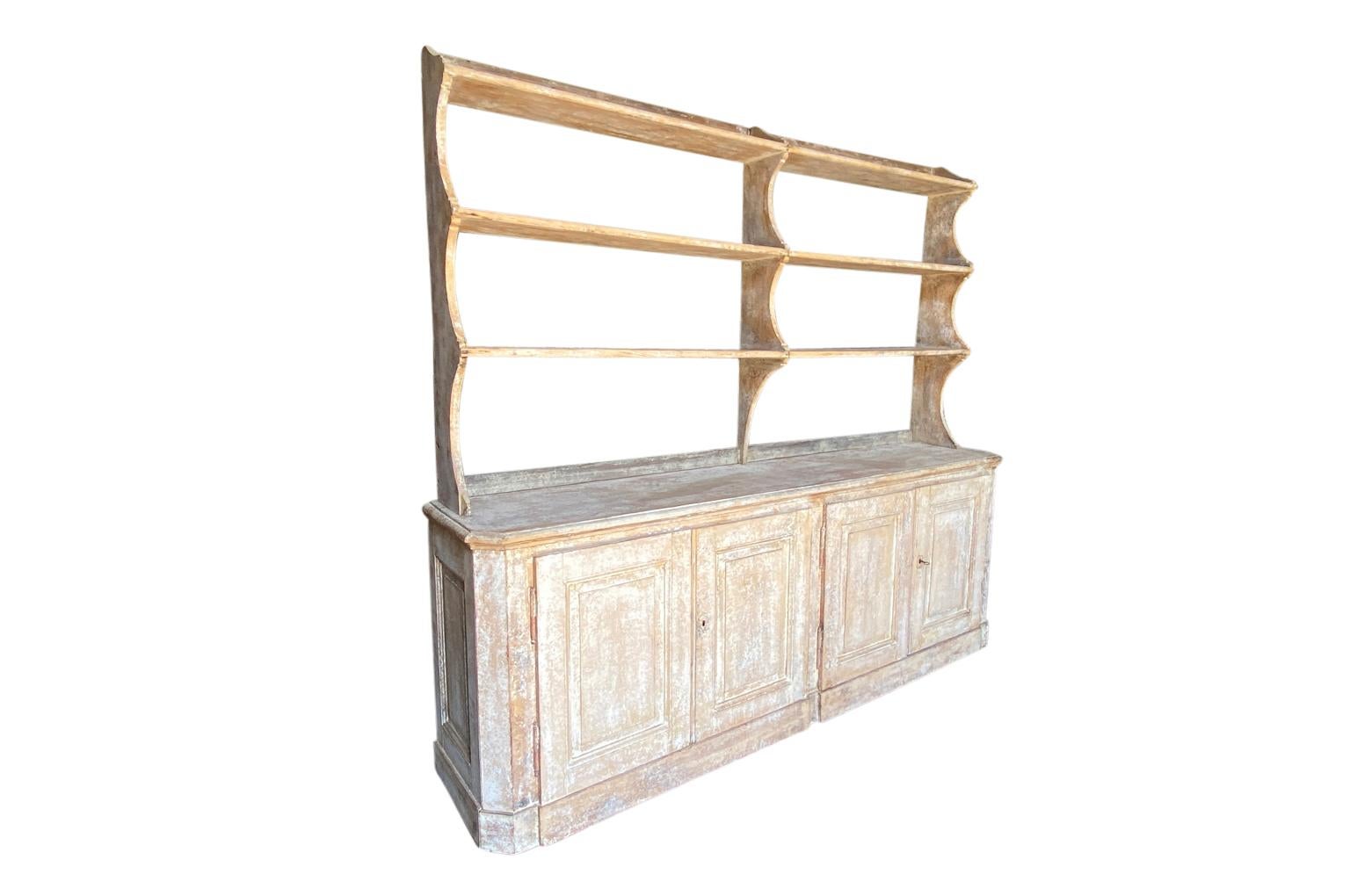 A charming mid-19th century Deux corps buffet - Etagere from the South of France. Wonderfully constructed from painted wood with four doors and open shelving. A wonderful storage and display piece, perfect for a kitchen, butler's pantry or living