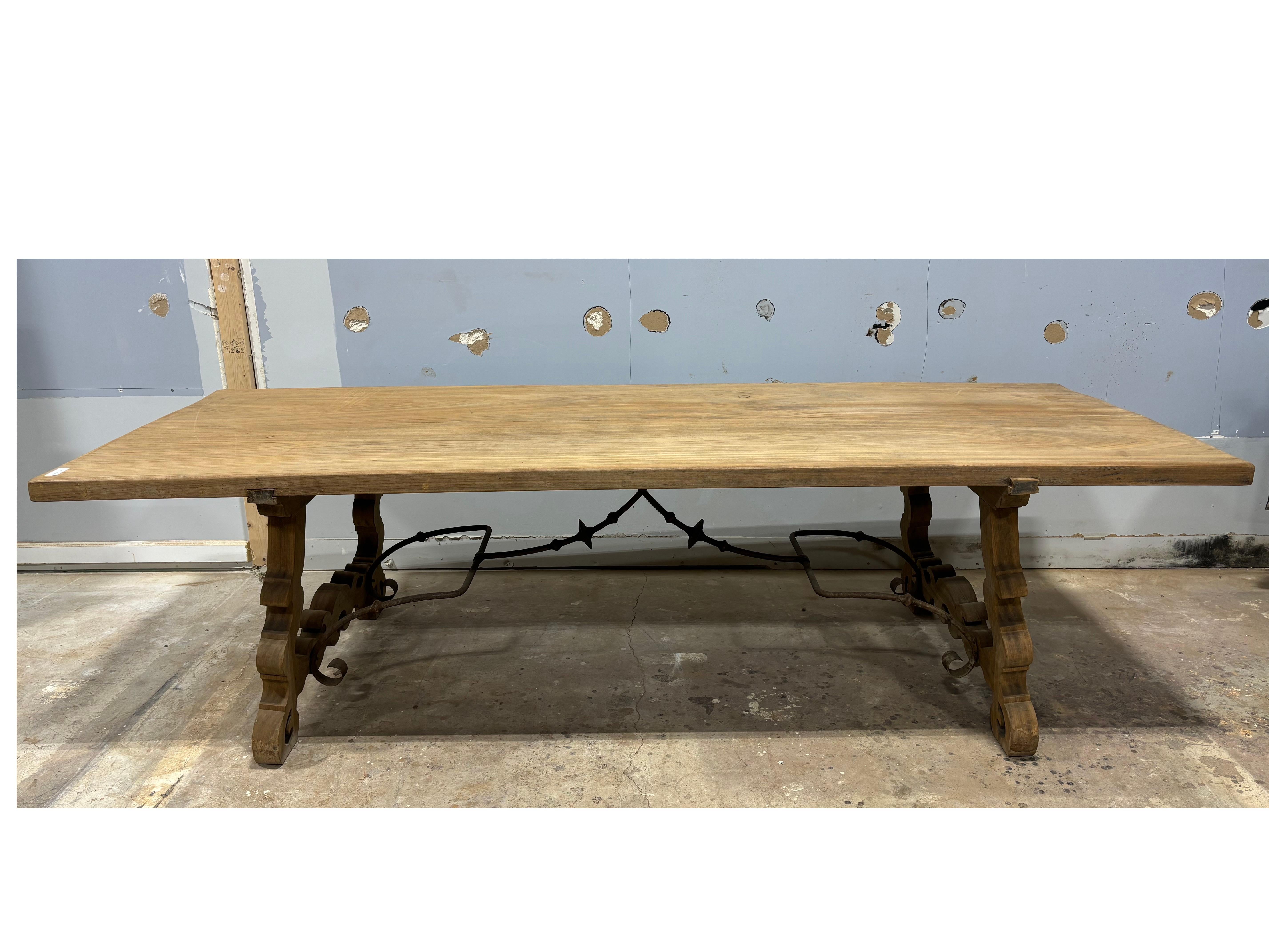 Exceptional Long and large Table with a beautiful Iron work at the base.