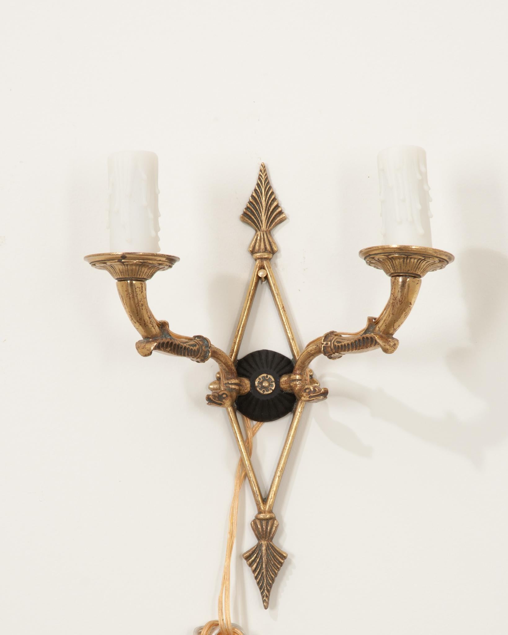 A single petite Empire sconce of classic French design. Perfect for that small space that needs a little extra light. Cleaned and US wired using UL listed parts.