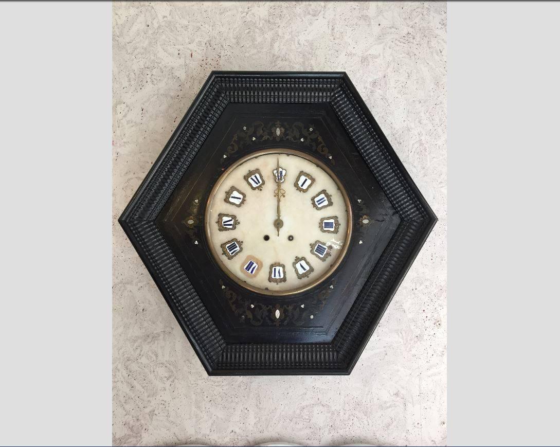 French Napoleon III style ebonized wall clock with enameled numbers on marble quarter and guilloche frame from 1860s
The clock has its original mechanism.
  
 