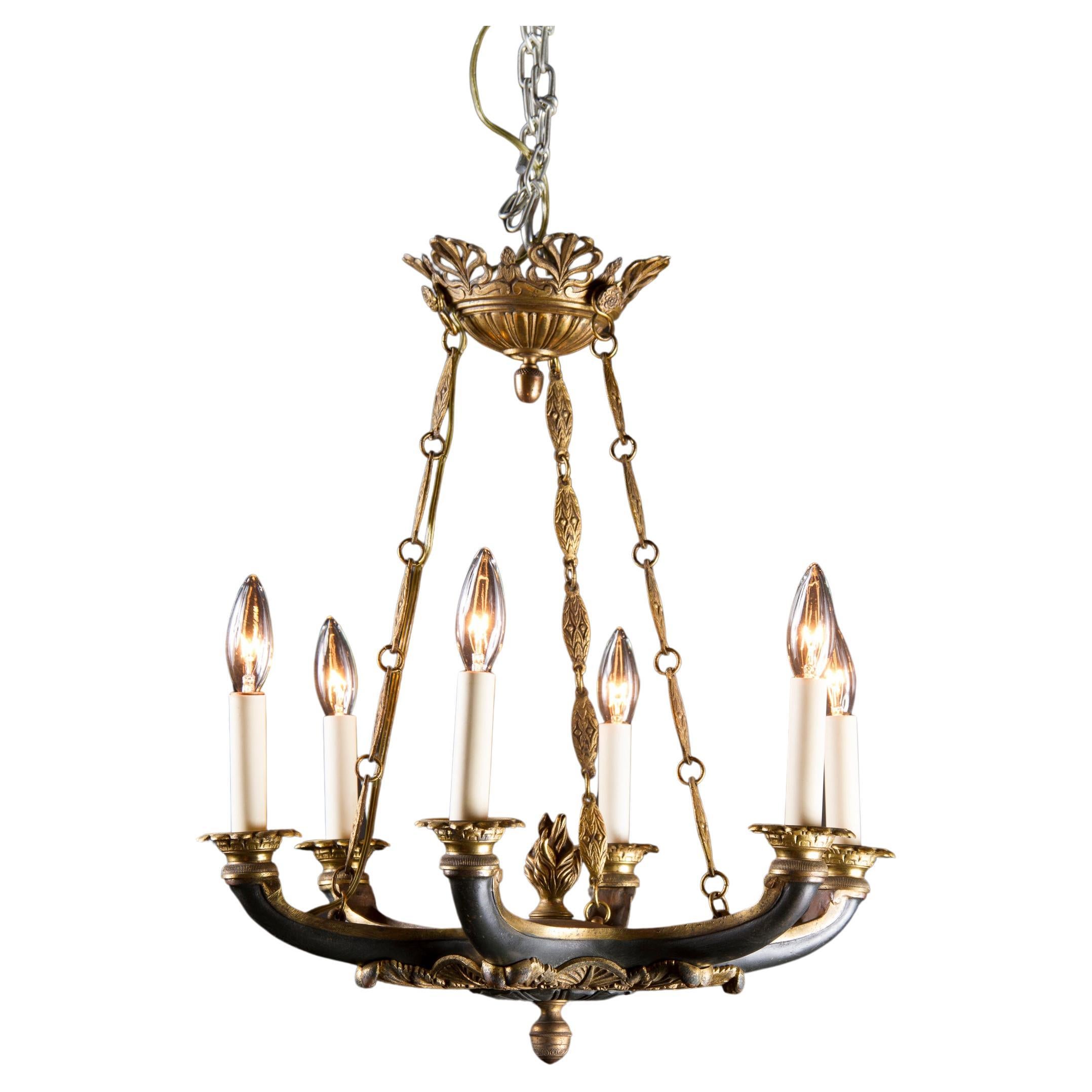 French 19th Century Empire Bronze Chandelier with Torch and Decorative Chain For Sale