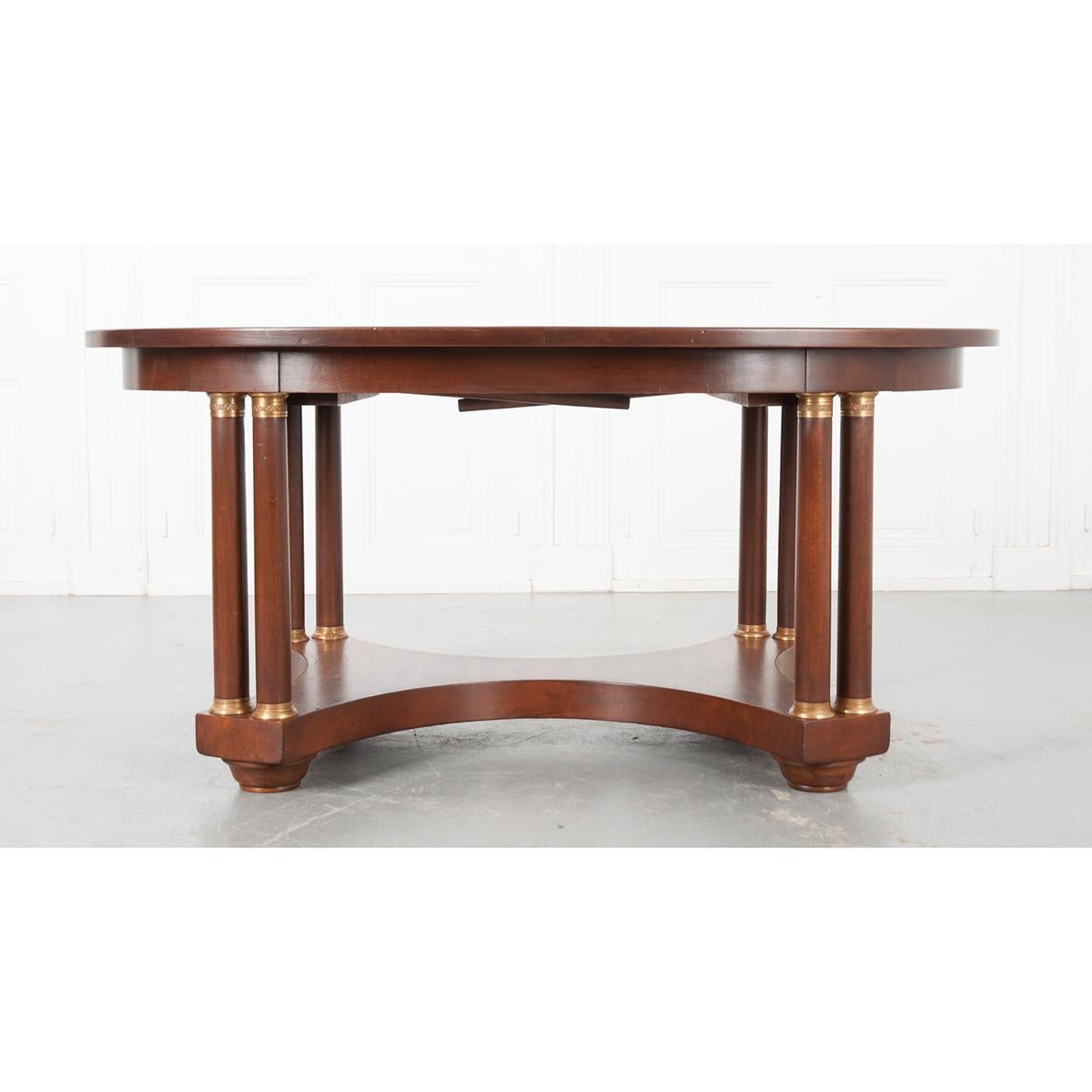 This Empire style table would be perfect as a dinning or central table. It has the ability to extend to 110” long with 4 foldable legs attached for stability. Leaves not included with the table. This stunning table is supported by 8 column legs