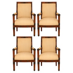 French 19th century Empire st. Mahogany and patinated Wood armchairs