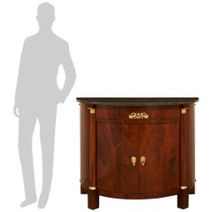 French 19th century Empire st. Mahogany, Ormolu and Fossilized marble cabinet