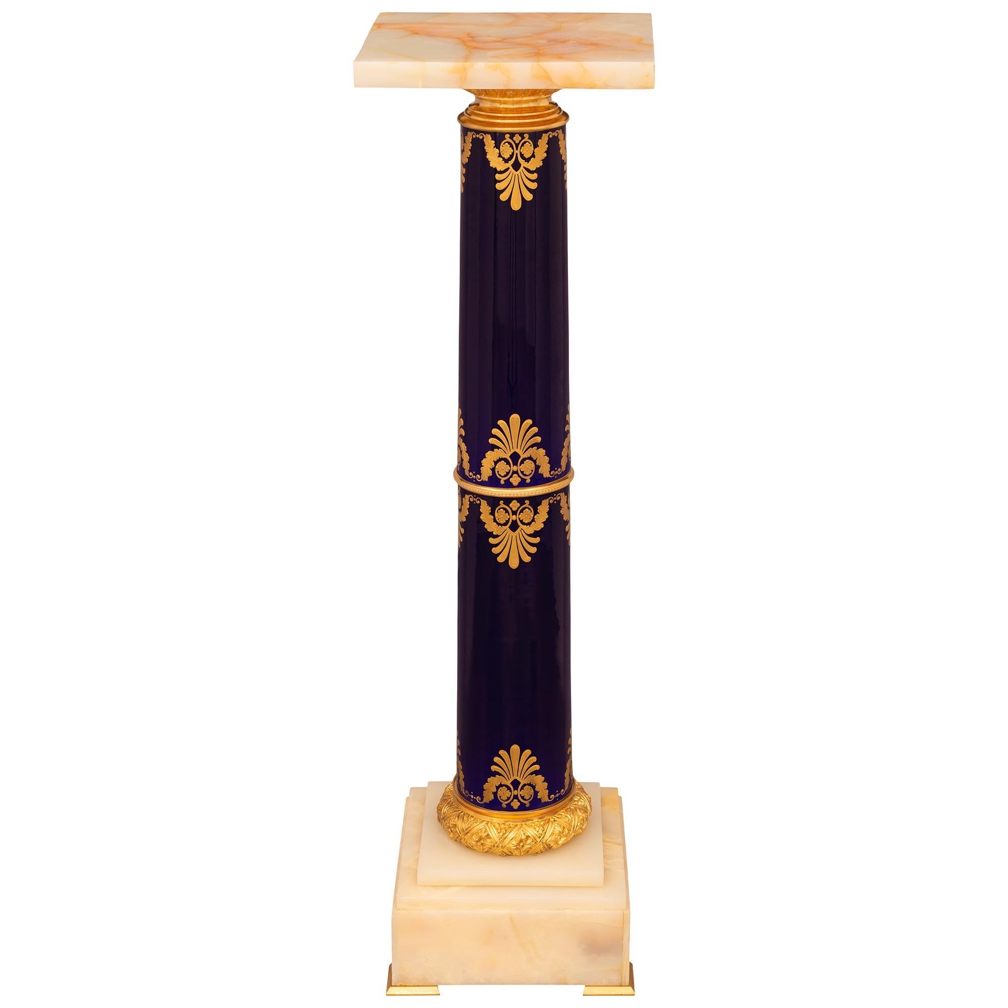 French 19th Century Empire St. Sèvres Porcelain, Gilt, Onyx, And Ormolu Pedestal In Good Condition For Sale In West Palm Beach, FL