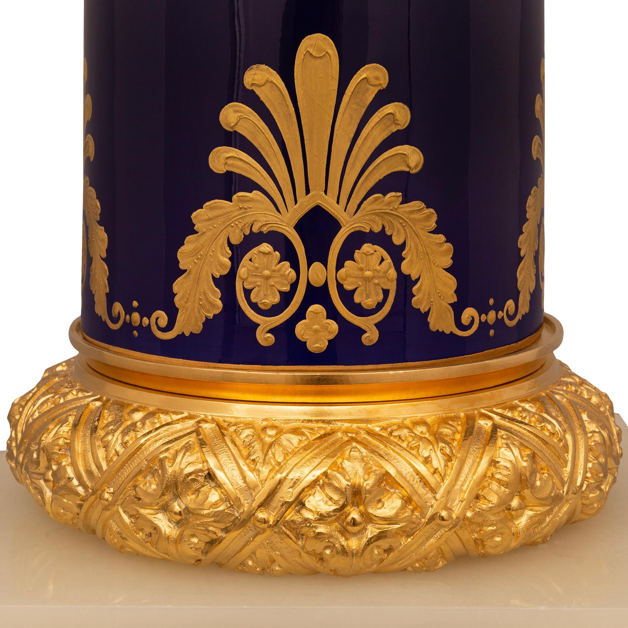 French 19th Century Empire St. Sèvres Porcelain, Gilt, Onyx, And Ormolu Pedestal For Sale 4