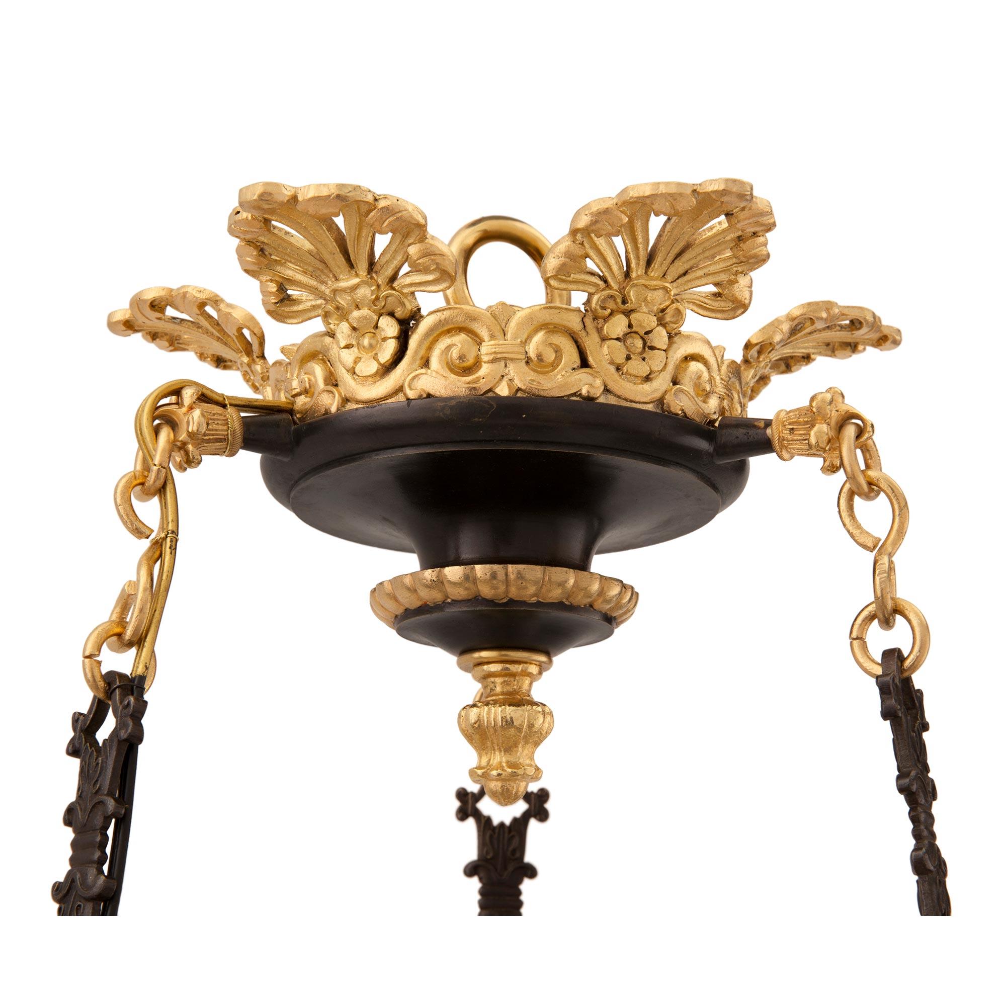 French 19th Century Empire Style Patinated Bronze and Ormolu Six-Arm Chandelier In Good Condition For Sale In West Palm Beach, FL