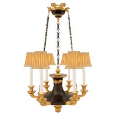 Lustre à six bras de style Empire français du XIXe siècle en bronze patiné et bronze doré