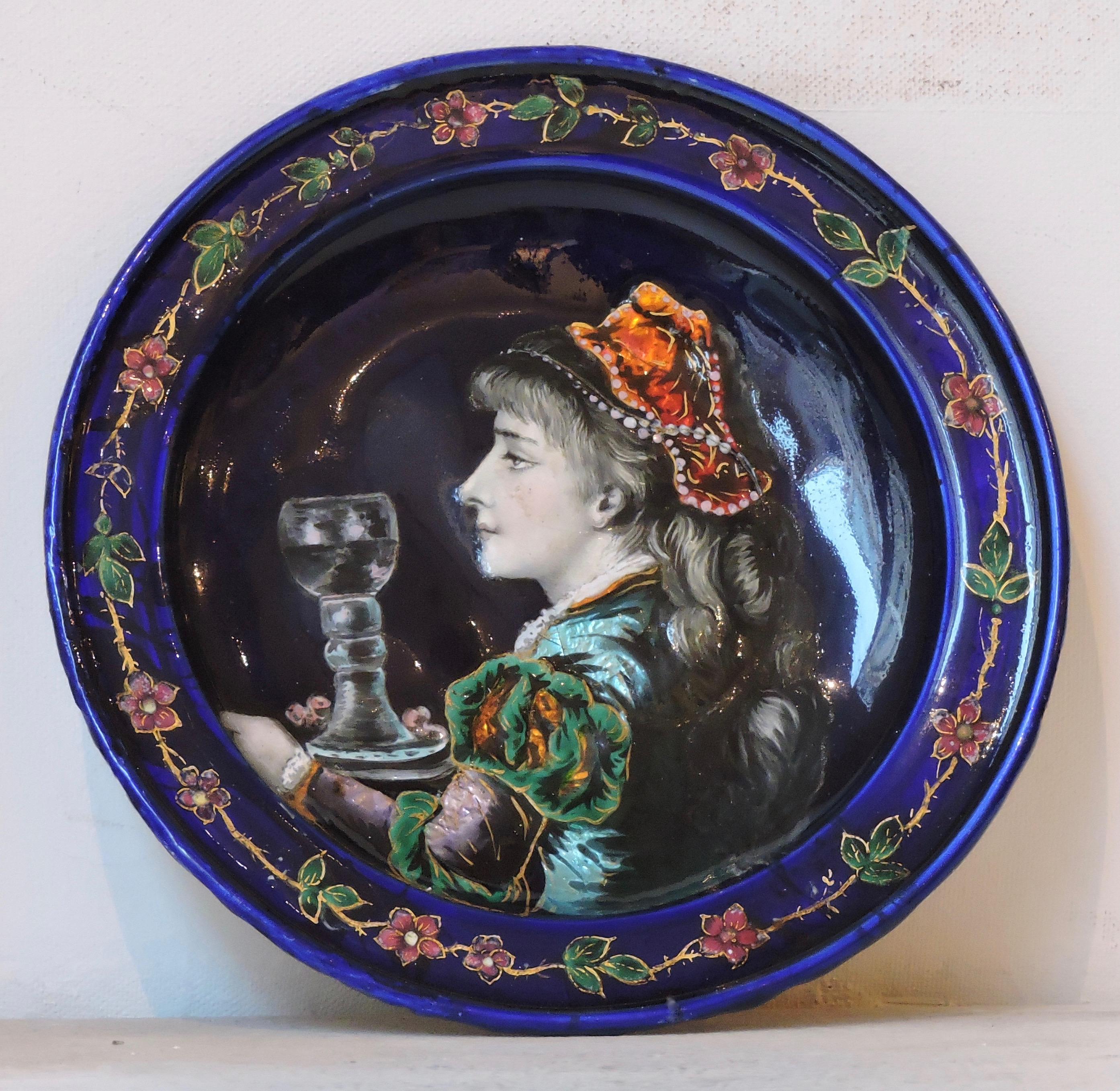 A French 19th century enamel on copper pair of plates, circa 1880
Two polychromed enameled plates representing a Renaissance couple of costumed nobles, 
circa 1880.